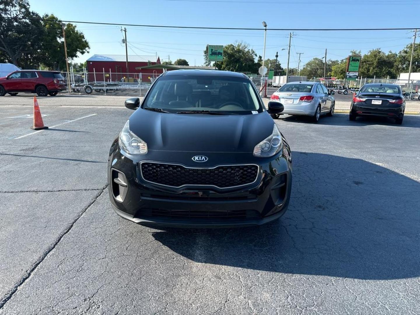 2017 BLACK KIA SPORTAGE LX (KNDPM3AC6H7) with an 2.4L engine, Automatic transmission, located at 2929 9th St. West, Bradenton, 34205, (941) 242-2810, 27.473591, -82.570679 - Photo#2