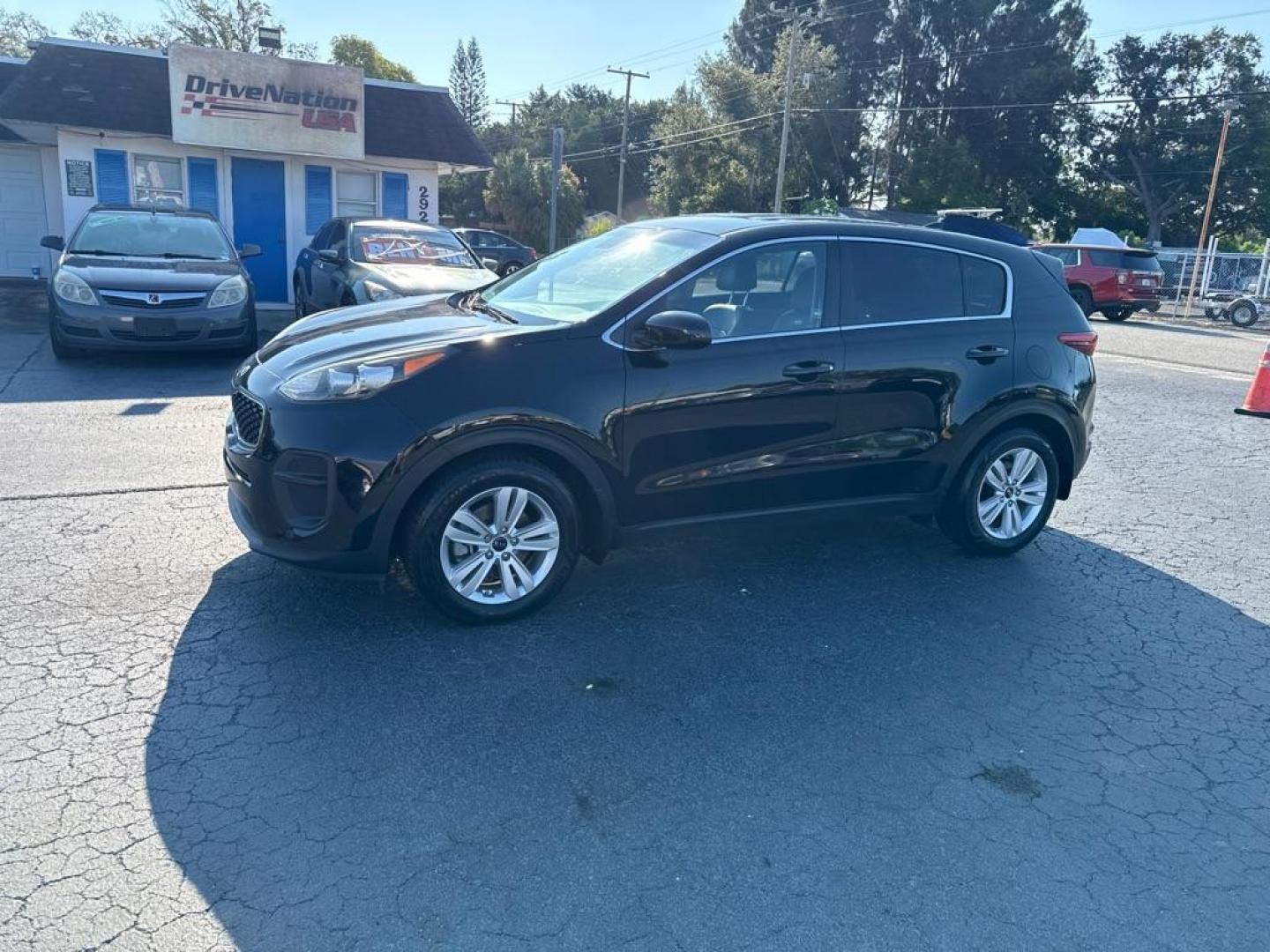 2017 BLACK KIA SPORTAGE LX (KNDPM3AC6H7) with an 2.4L engine, Automatic transmission, located at 2929 9th St. West, Bradenton, 34205, (941) 242-2810, 27.473591, -82.570679 - Photo#3