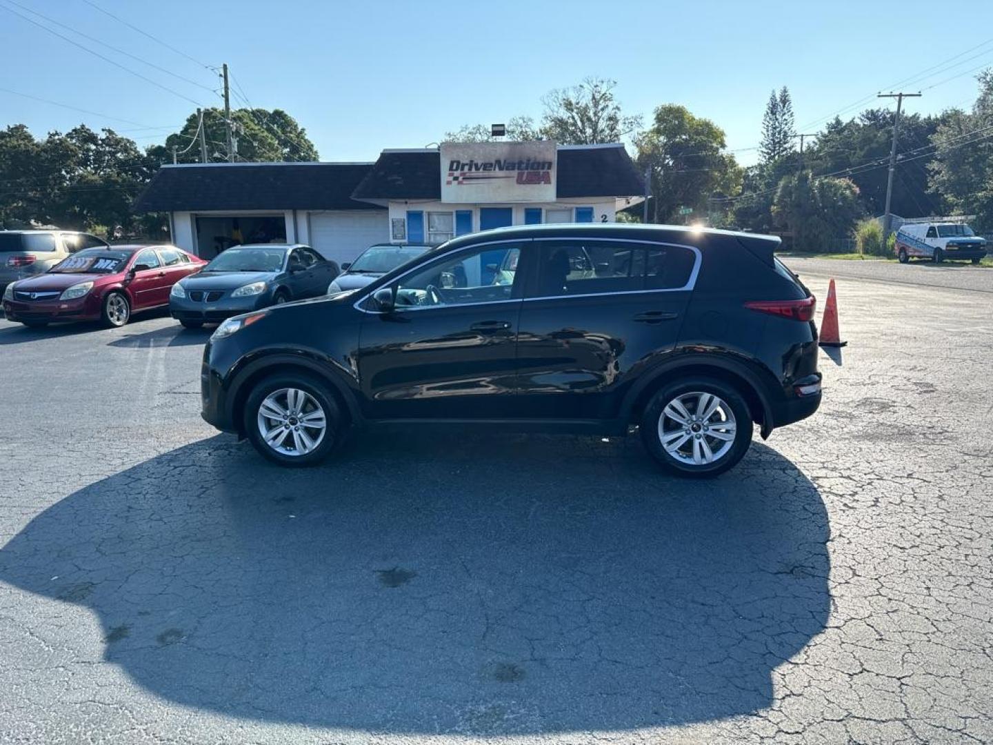 2017 BLACK KIA SPORTAGE LX (KNDPM3AC6H7) with an 2.4L engine, Automatic transmission, located at 2929 9th St. West, Bradenton, 34205, (941) 242-2810, 27.473591, -82.570679 - Photo#4