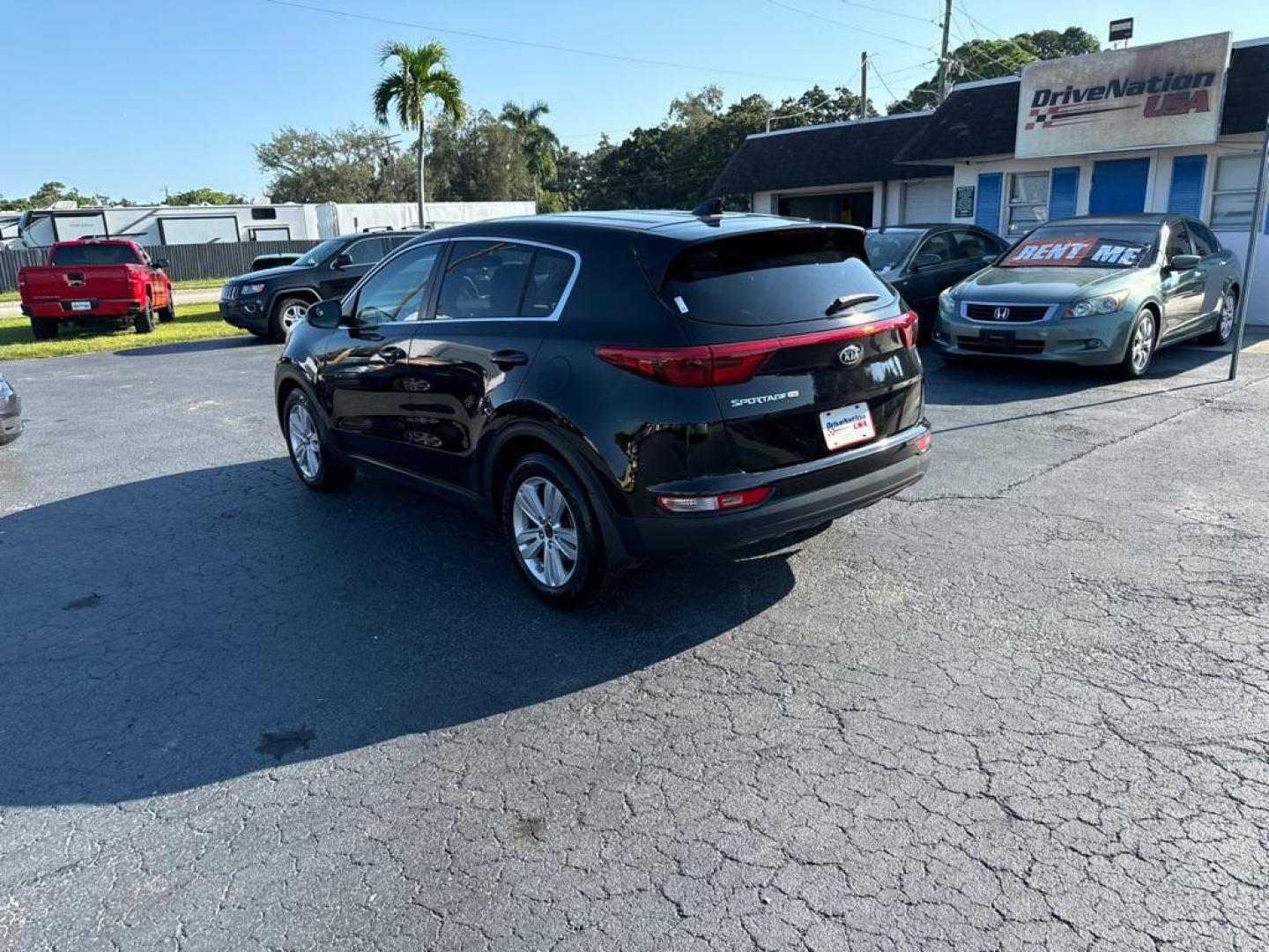 2017 BLACK KIA SPORTAGE LX (KNDPM3AC6H7) with an 2.4L engine, Automatic transmission, located at 2929 9th St. West, Bradenton, 34205, (941) 242-2810, 27.473591, -82.570679 - Photo#5