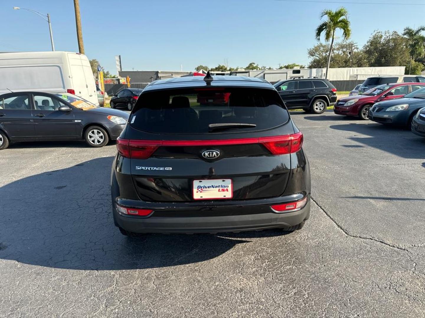 2017 BLACK KIA SPORTAGE LX (KNDPM3AC6H7) with an 2.4L engine, Automatic transmission, located at 2929 9th St. West, Bradenton, 34205, (941) 242-2810, 27.473591, -82.570679 - Photo#6