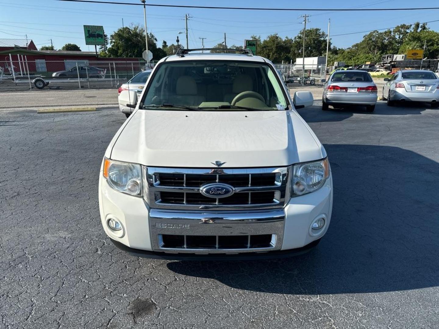 2011 WHITE FORD ESCAPE LIMITED (1FMCU9EG3BK) with an 3.0L engine, Automatic transmission, located at 2929 9th St. West, Bradenton, 34205, (941) 242-2810, 27.473591, -82.570679 - Photo#2