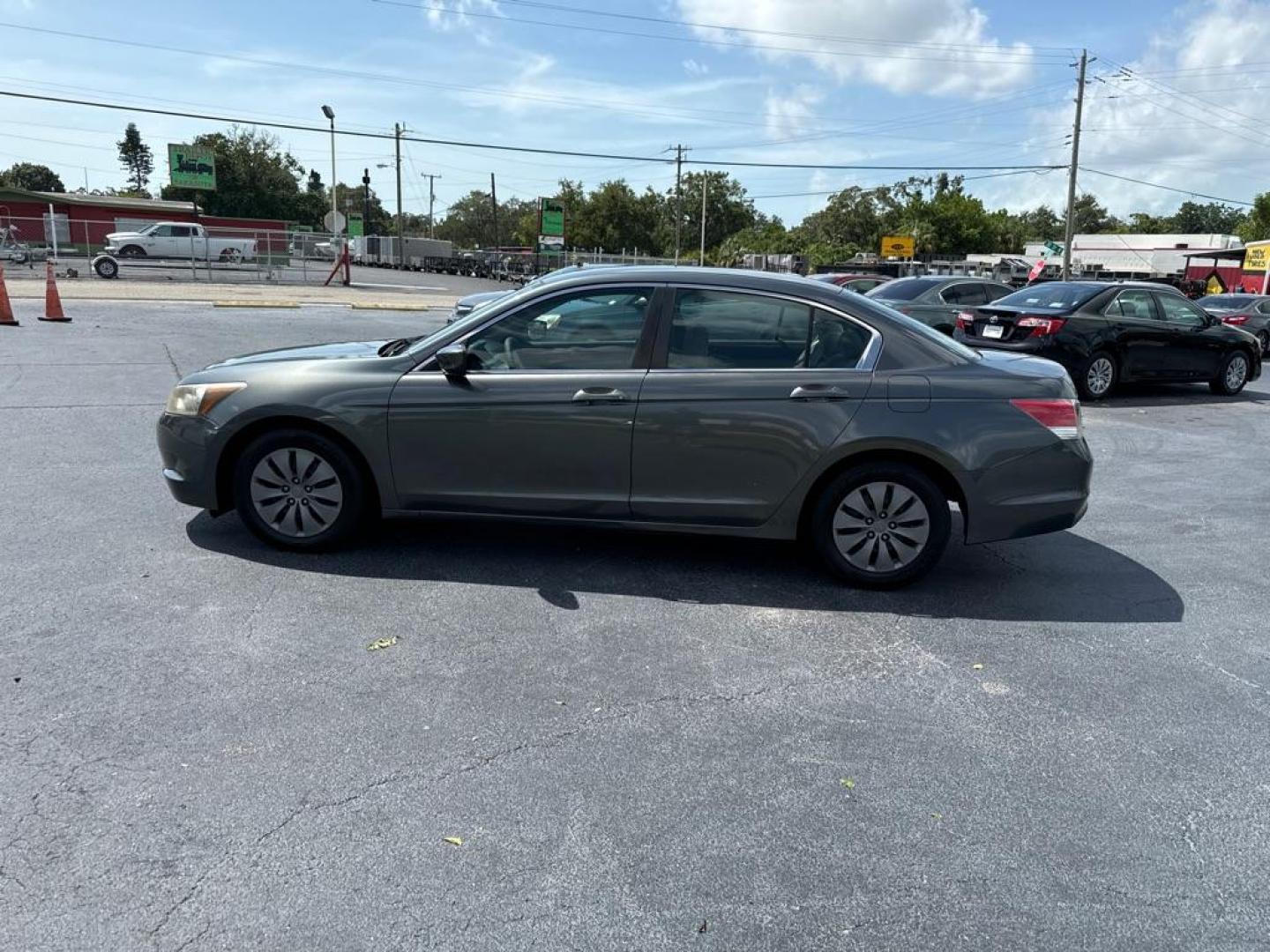 2009 SILVER HONDA ACCORD LX (1HGCP26349A) with an 2.4L engine, Automatic transmission, located at 2929 9th St. West, Bradenton, 34205, (941) 242-2810, 27.473591, -82.570679 - Photo#4