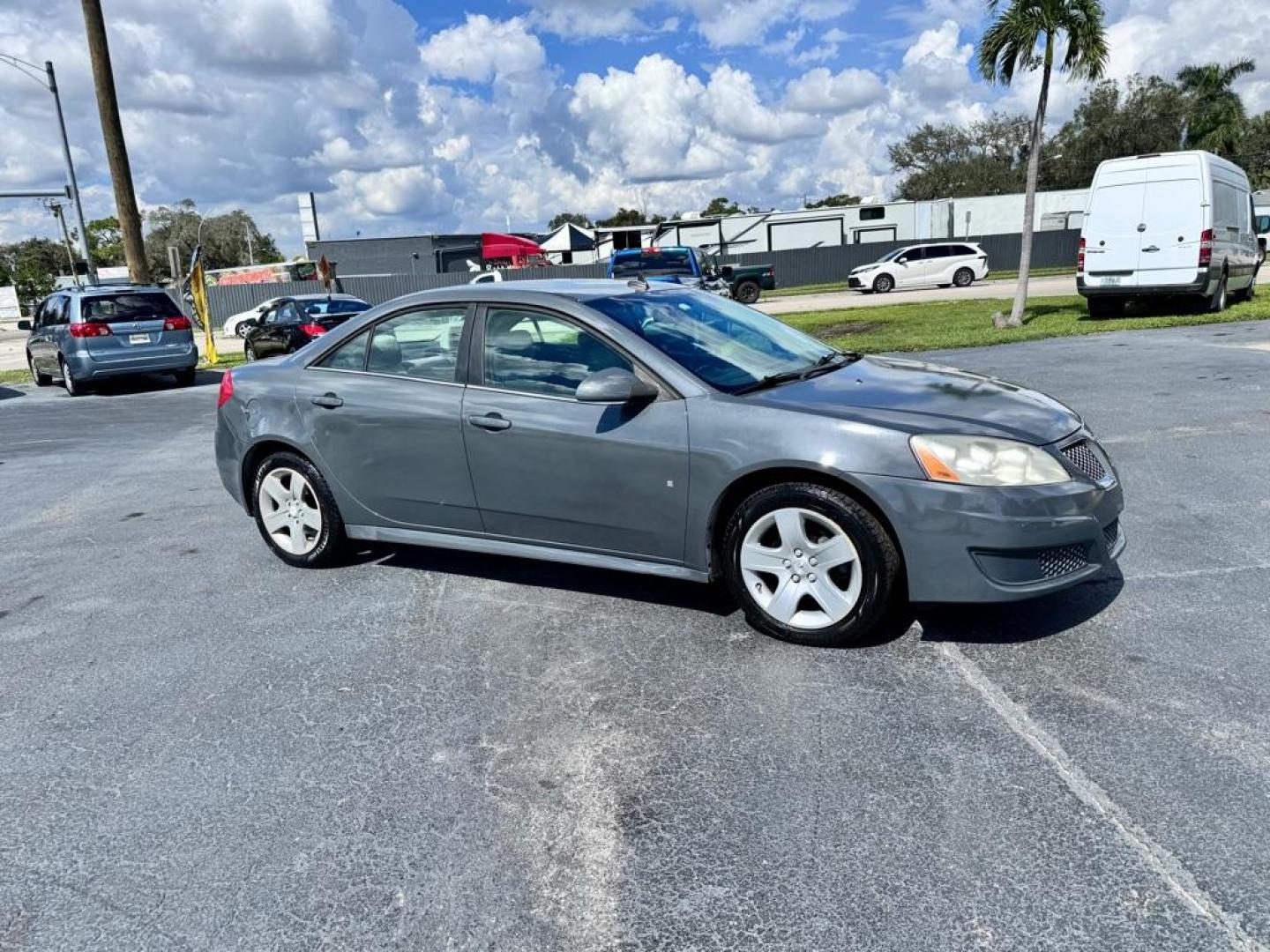 2009 GRAY PONTIAC G6 G6 (1G2ZJ57B694) with an 2.4L engine, Automatic transmission, located at 2929 9th St. West, Bradenton, 34205, (941) 242-2810, 27.473591, -82.570679 - Thanks for inquring into DriveNation USA! All vehicles listed can be viewed at www.drivenationusa.com for vehicle history reports and additonal info. We cannot quote any terms such as down payments or monthly payments without an application. You can apply directly at www.drivenationusa.com or by con - Photo#0