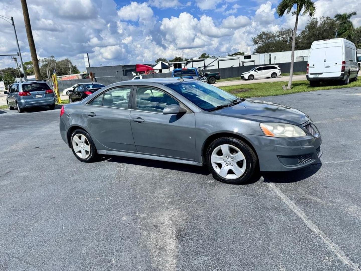 2009 GRAY PONTIAC G6 G6 (1G2ZJ57B694) with an 2.4L engine, Automatic transmission, located at 2929 9th St. West, Bradenton, 34205, (941) 242-2810, 27.473591, -82.570679 - Thanks for inquring into DriveNation USA! All vehicles listed can be viewed at www.drivenationusa.com for vehicle history reports and additonal info. We cannot quote any terms such as down payments or monthly payments without an application. You can apply directly at www.drivenationusa.com or by con - Photo#1