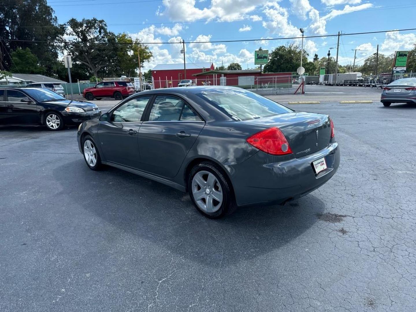 2009 GRAY PONTIAC G6 G6 (1G2ZJ57B694) with an 2.4L engine, Automatic transmission, located at 2929 9th St. West, Bradenton, 34205, (941) 242-2810, 27.473591, -82.570679 - Thanks for inquring into DriveNation USA! All vehicles listed can be viewed at www.drivenationusa.com for vehicle history reports and additonal info. We cannot quote any terms such as down payments or monthly payments without an application. You can apply directly at www.drivenationusa.com or by con - Photo#5