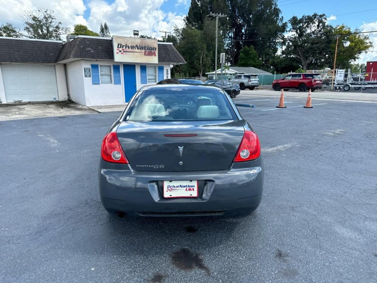 2009 GRAY PONTIAC G6 G6 (1G2ZJ57B694) with an 2.4L engine, Automatic transmission, located at 2929 9th St. West, Bradenton, 34205, (941) 242-2810, 27.473591, -82.570679 - Thanks for inquring into DriveNation USA! All vehicles listed can be viewed at www.drivenationusa.com for vehicle history reports and additonal info. We cannot quote any terms such as down payments or monthly payments without an application. You can apply directly at www.drivenationusa.com or by con - Photo#6