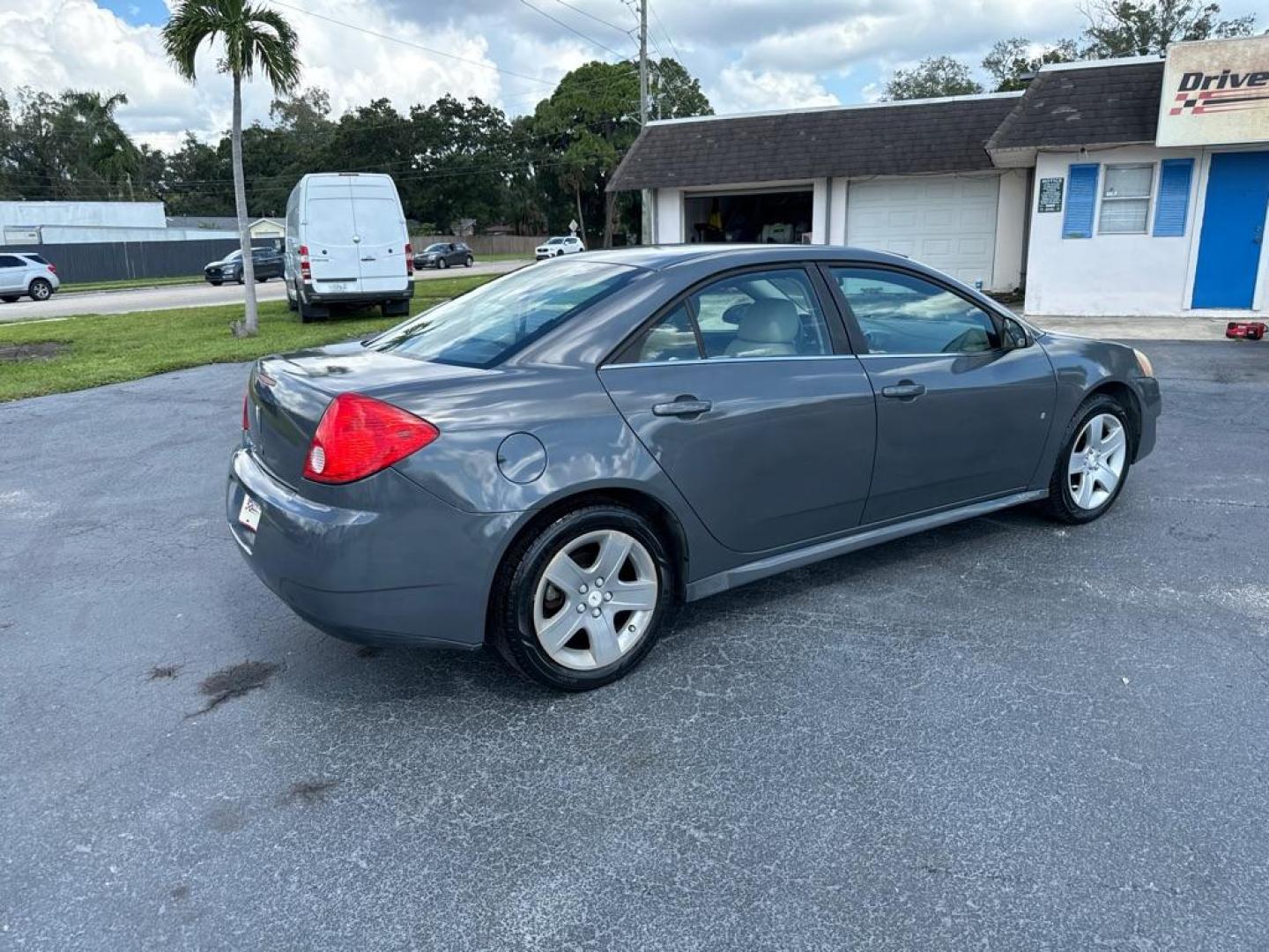 2009 GRAY PONTIAC G6 G6 (1G2ZJ57B694) with an 2.4L engine, Automatic transmission, located at 2929 9th St. West, Bradenton, 34205, (941) 242-2810, 27.473591, -82.570679 - Thanks for inquring into DriveNation USA! All vehicles listed can be viewed at www.drivenationusa.com for vehicle history reports and additonal info. We cannot quote any terms such as down payments or monthly payments without an application. You can apply directly at www.drivenationusa.com or by con - Photo#7