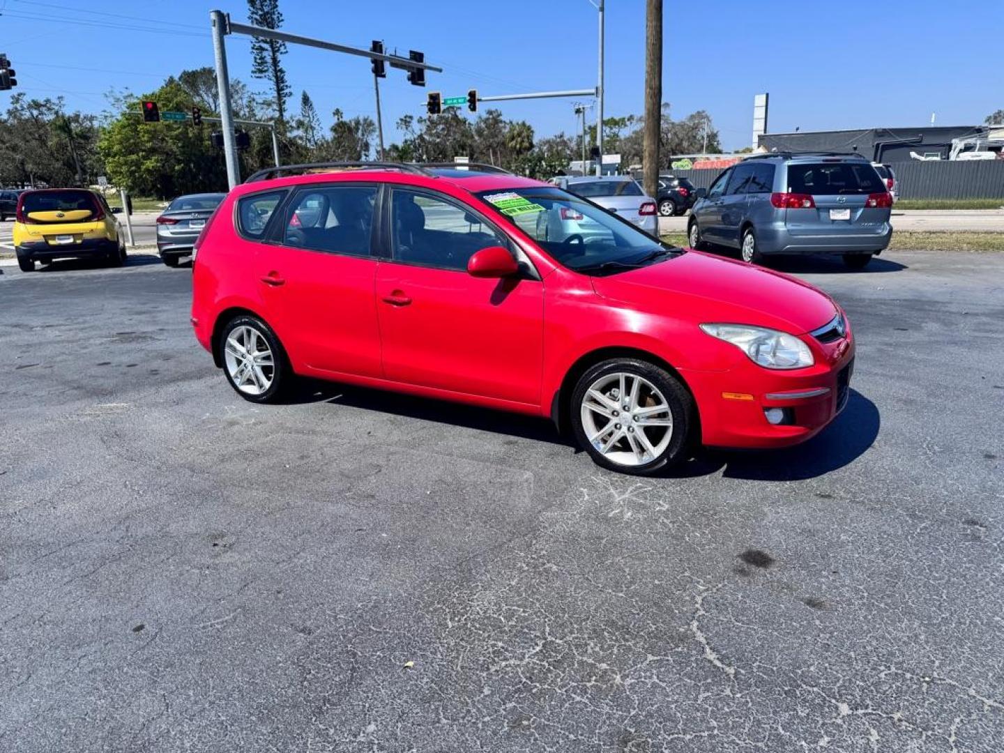 2010 RED HYUNDAI ELANTRA TOURING GLS (KMHDC8AE7AU) with an 2.0L engine, Automatic transmission, located at 2929 9th St. West, Bradenton, 34205, (941) 242-2810, 27.473591, -82.570679 - Thanks for inquring into DriveNation USA! All vehicles listed can be viewed at www.drivenationusa.com for vehicle history reports and additonal info. We cannot quote any terms such as down payments or monthly payments without an application. You can apply directly at www.drivenationusa.com or by con - Photo#1