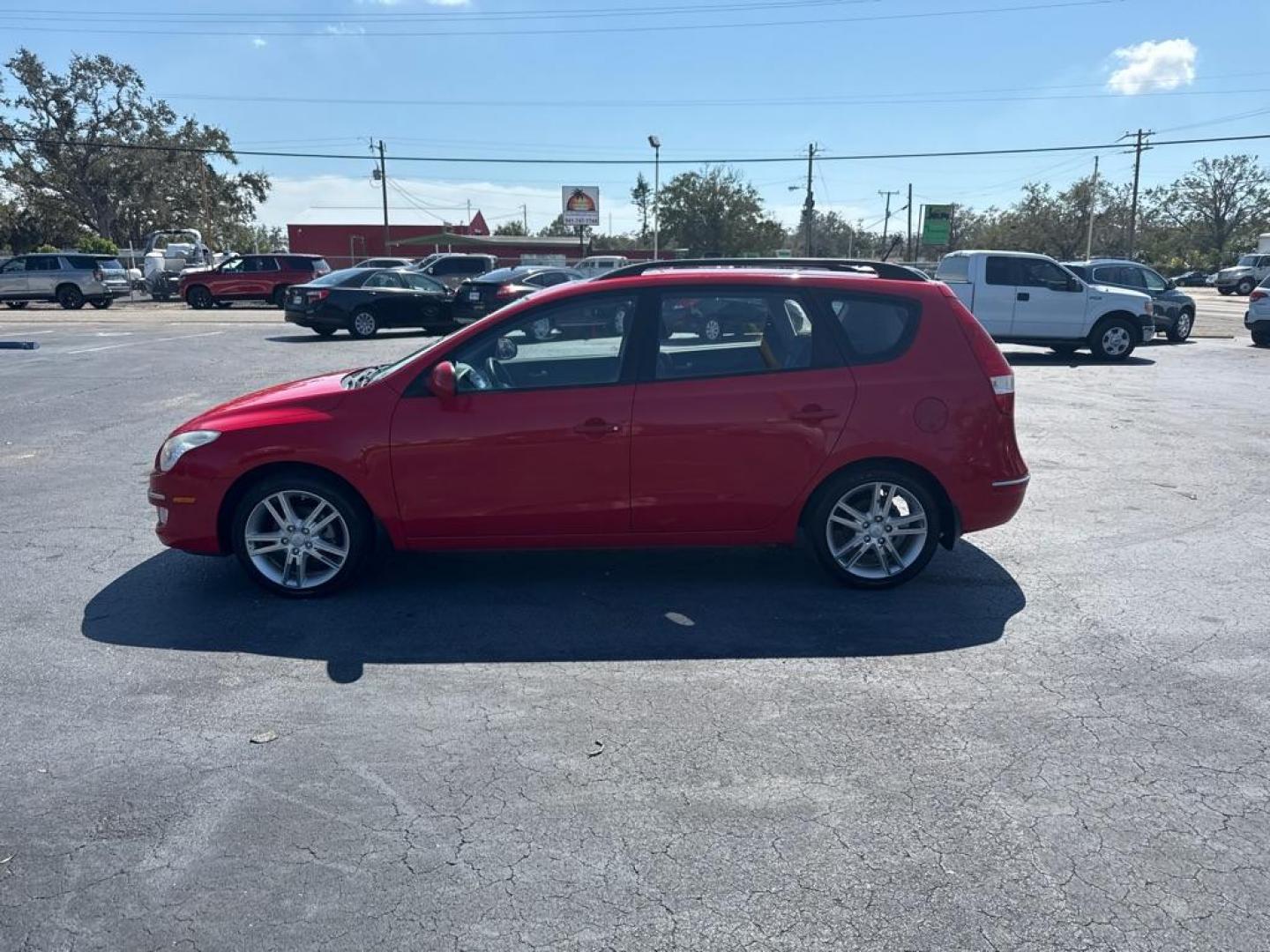 2010 RED HYUNDAI ELANTRA TOURING GLS (KMHDC8AE7AU) with an 2.0L engine, Automatic transmission, located at 2929 9th St. West, Bradenton, 34205, (941) 242-2810, 27.473591, -82.570679 - Thanks for inquring into DriveNation USA! All vehicles listed can be viewed at www.drivenationusa.com for vehicle history reports and additonal info. We cannot quote any terms such as down payments or monthly payments without an application. You can apply directly at www.drivenationusa.com or by con - Photo#4