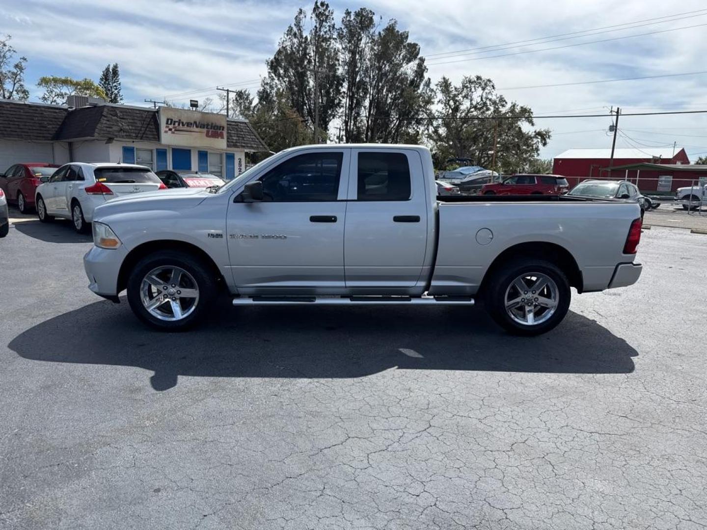 2012 SILVER DODGE RAM 1500 SLT (1C6RD6FT0CS) with an 5.7L engine, Automatic transmission, located at 2929 9th St. West, Bradenton, 34205, (941) 242-2810, 27.473591, -82.570679 - Thanks for inquring into DriveNation USA! All vehicles listed can be viewed at www.drivenationusa.com for vehicle history reports and additonal info. We cannot quote any terms such as down payments or monthly payments without an application. You can apply directly at www.drivenationusa.com or by con - Photo#4