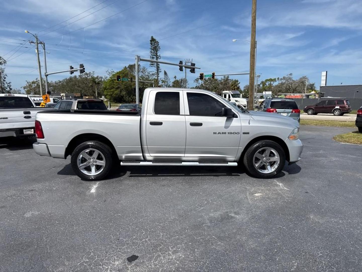 2012 SILVER DODGE RAM 1500 SLT (1C6RD6FT0CS) with an 5.7L engine, Automatic transmission - Thanks for inquring into DriveNation USA! All vehicles listed can be viewed at www.drivenationusa.com for vehicle history reports and additonal info. We cannot quote any terms such as down payments or monthly payments without an application. You can apply directly at www.drivenationusa.com or by con - Photo#8