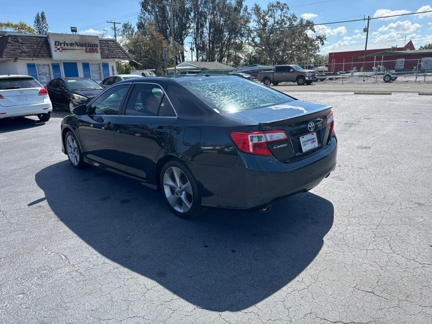 2014 GRAY TOYOTA CAMRY SE (4T1BK1FK9EU) with an 3.5L engine, Automatic transmission, located at 2929 9th St. West, Bradenton, 34205, (941) 242-2810, 27.473591, -82.570679 - Thanks for inquring into DriveNation USA! All vehicles listed can be viewed at www.drivenationusa.com for vehicle history reports and additonal info. We cannot quote any terms such as down payments or monthly payments without an application. You can apply directly at www.drivenationusa.com or by con - Photo#5