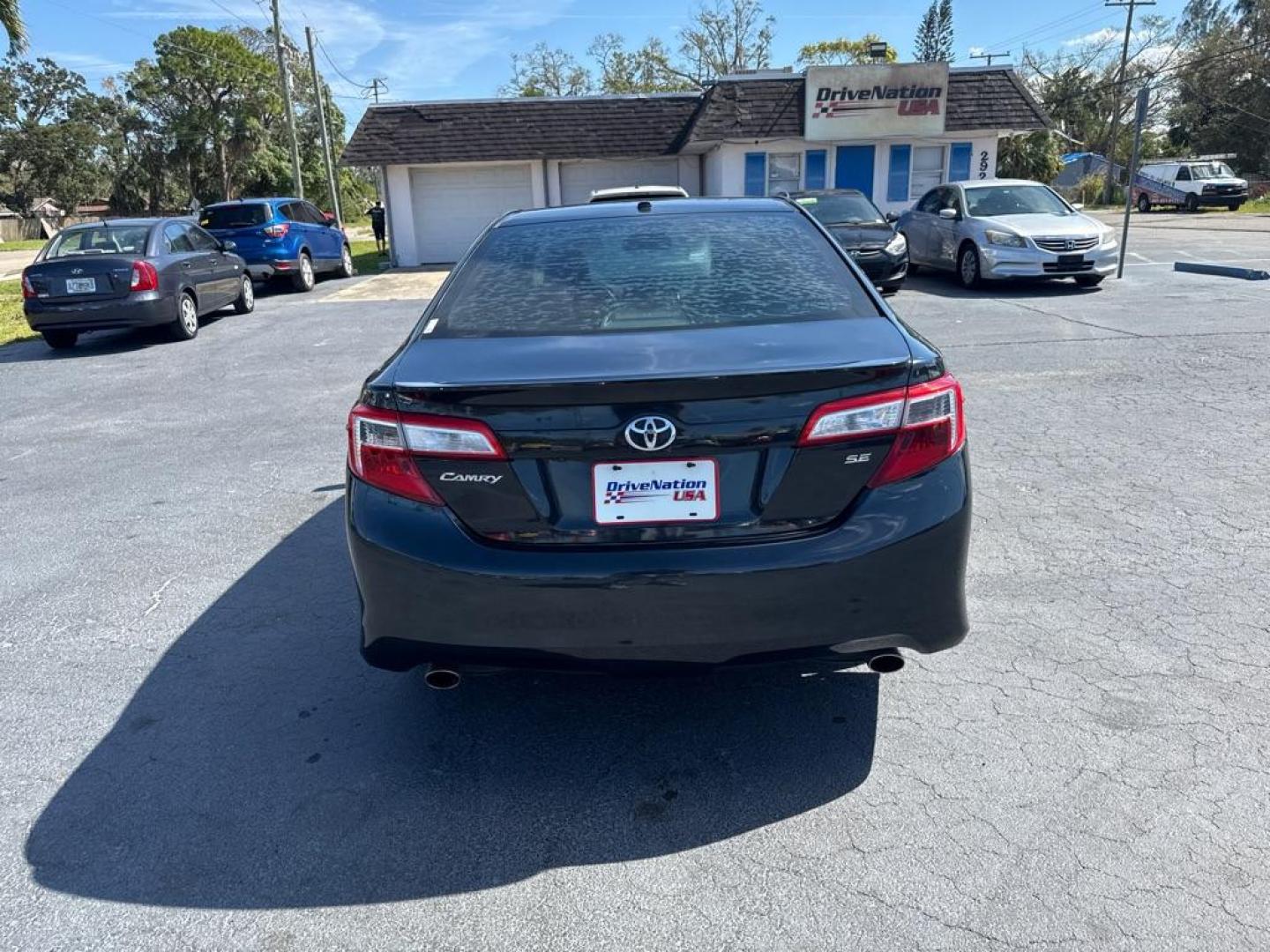 2014 GRAY TOYOTA CAMRY SE (4T1BK1FK9EU) with an 3.5L engine, Automatic transmission, located at 2929 9th St. West, Bradenton, 34205, (941) 242-2810, 27.473591, -82.570679 - Thanks for inquring into DriveNation USA! All vehicles listed can be viewed at www.drivenationusa.com for vehicle history reports and additonal info. We cannot quote any terms such as down payments or monthly payments without an application. You can apply directly at www.drivenationusa.com or by con - Photo#6