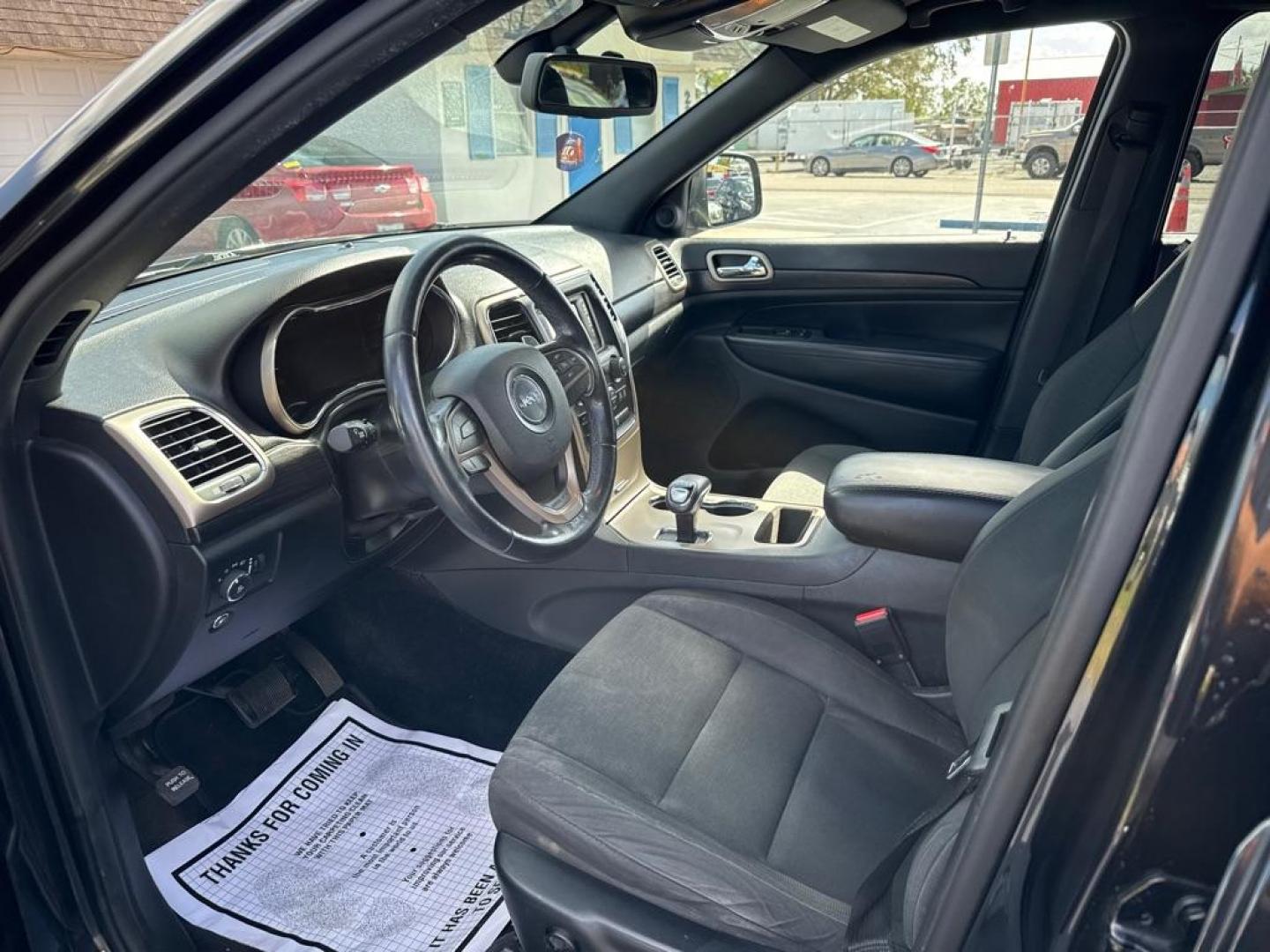 2014 BLACK JEEP GRAND CHEROKEE LAREDO (1C4RJFAG5EC) with an 3.6L engine, Automatic transmission, located at 2929 9th St. West, Bradenton, 34205, (941) 242-2810, 27.473591, -82.570679 - Thanks for inquring into DriveNation USA! All vehicles listed can be viewed at www.drivenationusa.com for vehicle history reports and additonal info. We cannot quote any terms such as down payments or monthly payments without an application. You can apply directly at www.drivenationusa.com or by con - Photo#10