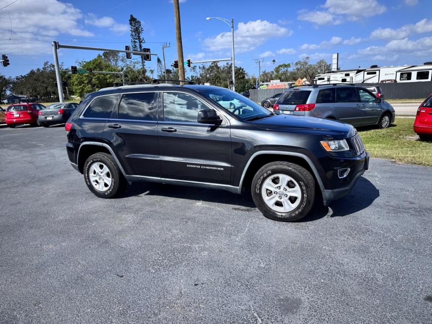 2014 BLACK JEEP GRAND CHEROKEE LAREDO (1C4RJFAG5EC) with an 3.6L engine, Automatic transmission, located at 2929 9th St. West, Bradenton, 34205, (941) 242-2810, 27.473591, -82.570679 - Thanks for inquring into DriveNation USA! All vehicles listed can be viewed at www.drivenationusa.com for vehicle history reports and additonal info. We cannot quote any terms such as down payments or monthly payments without an application. You can apply directly at www.drivenationusa.com or by con - Photo#1