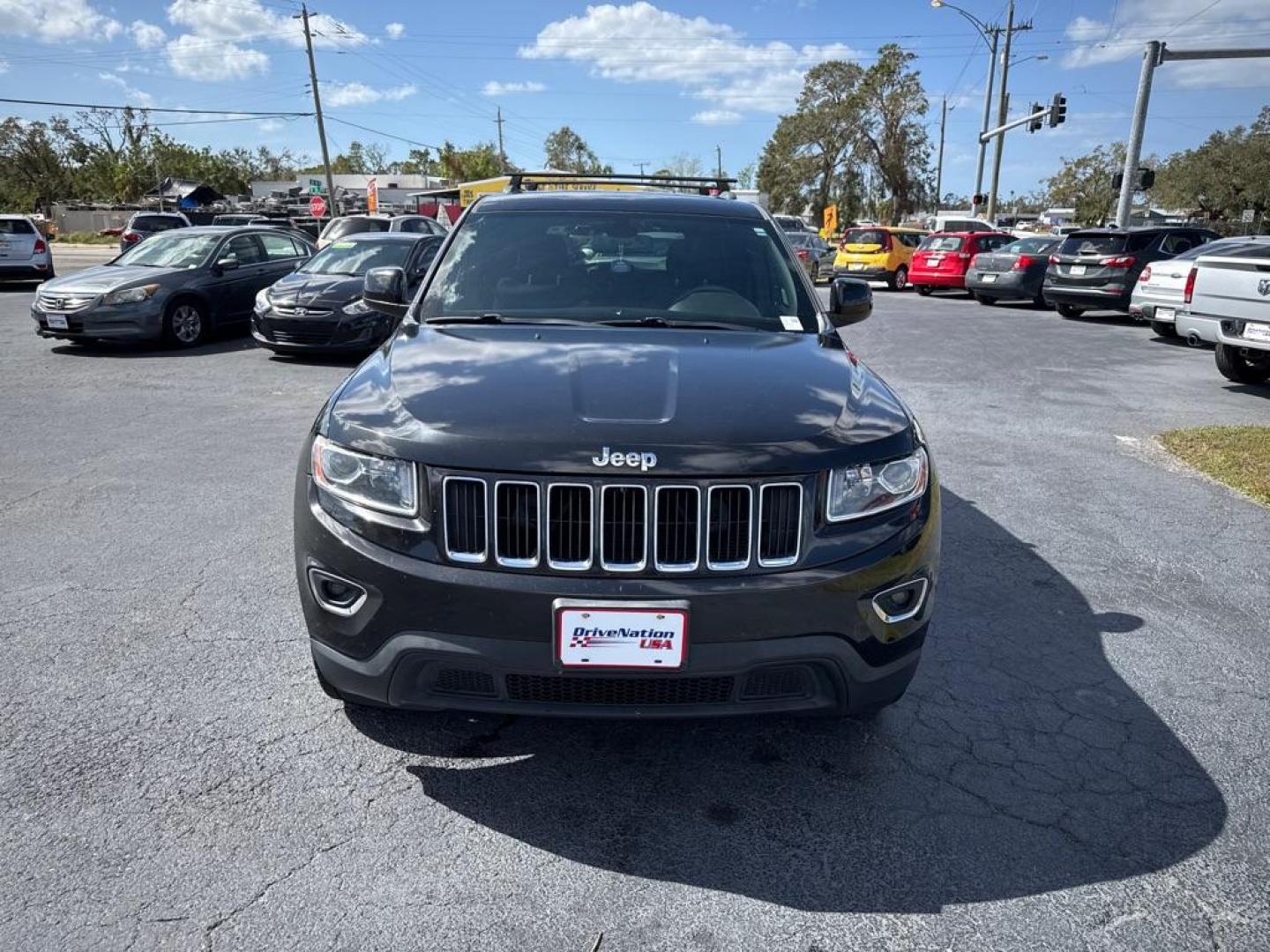 2014 BLACK JEEP GRAND CHEROKEE LAREDO (1C4RJFAG5EC) with an 3.6L engine, Automatic transmission, located at 2929 9th St. West, Bradenton, 34205, (941) 242-2810, 27.473591, -82.570679 - Thanks for inquring into DriveNation USA! All vehicles listed can be viewed at www.drivenationusa.com for vehicle history reports and additonal info. We cannot quote any terms such as down payments or monthly payments without an application. You can apply directly at www.drivenationusa.com or by con - Photo#2