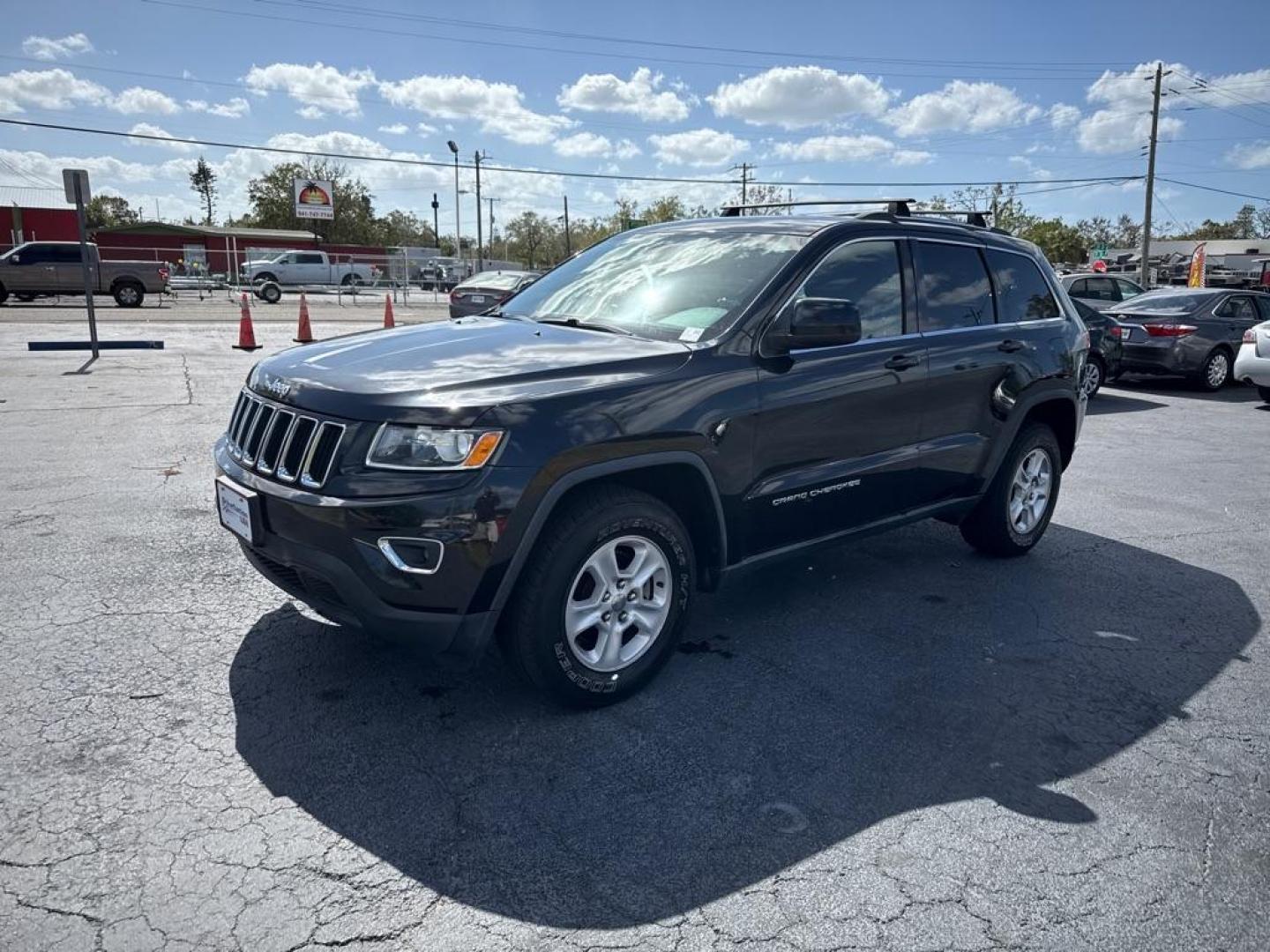 2014 BLACK JEEP GRAND CHEROKEE LAREDO (1C4RJFAG5EC) with an 3.6L engine, Automatic transmission, located at 2929 9th St. West, Bradenton, 34205, (941) 242-2810, 27.473591, -82.570679 - Thanks for inquring into DriveNation USA! All vehicles listed can be viewed at www.drivenationusa.com for vehicle history reports and additonal info. We cannot quote any terms such as down payments or monthly payments without an application. You can apply directly at www.drivenationusa.com or by con - Photo#3