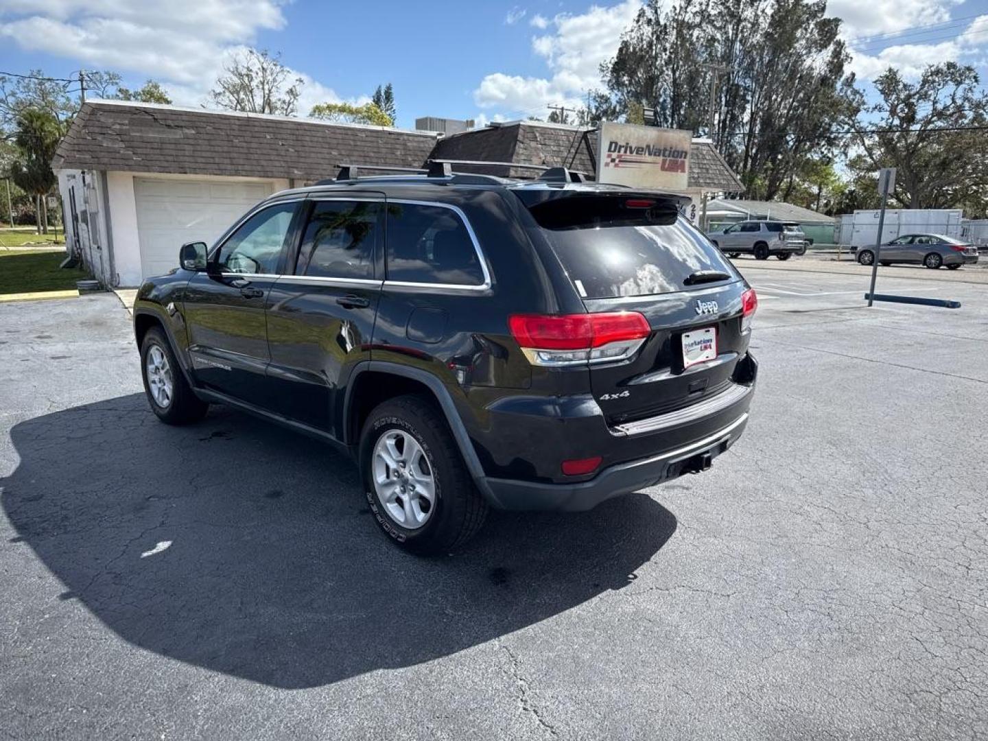 2014 BLACK JEEP GRAND CHEROKEE LAREDO (1C4RJFAG5EC) with an 3.6L engine, Automatic transmission, located at 2929 9th St. West, Bradenton, 34205, (941) 242-2810, 27.473591, -82.570679 - Thanks for inquring into DriveNation USA! All vehicles listed can be viewed at www.drivenationusa.com for vehicle history reports and additonal info. We cannot quote any terms such as down payments or monthly payments without an application. You can apply directly at www.drivenationusa.com or by con - Photo#5