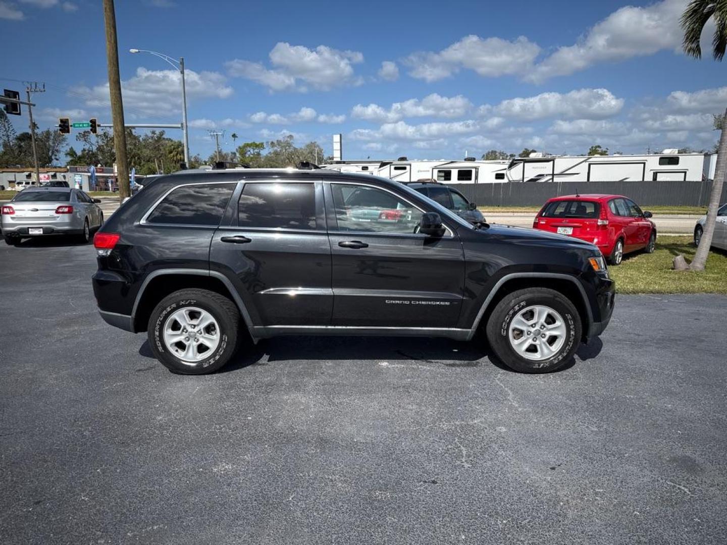 2014 BLACK JEEP GRAND CHEROKEE LAREDO (1C4RJFAG5EC) with an 3.6L engine, Automatic transmission, located at 2929 9th St. West, Bradenton, 34205, (941) 242-2810, 27.473591, -82.570679 - Thanks for inquring into DriveNation USA! All vehicles listed can be viewed at www.drivenationusa.com for vehicle history reports and additonal info. We cannot quote any terms such as down payments or monthly payments without an application. You can apply directly at www.drivenationusa.com or by con - Photo#8