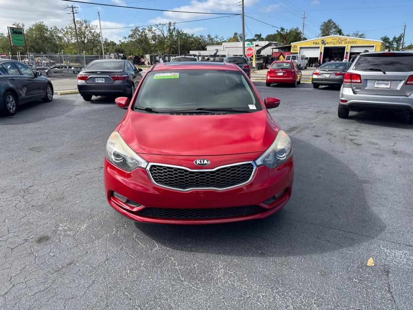 2016 RED KIA FORTE EX (KNAFZ4A84G5) with an 2.0L engine, Automatic transmission, located at 2929 9th St. West, Bradenton, 34205, (941) 242-2810, 27.473591, -82.570679 - Thanks for inquring into DriveNation USA! All vehicles listed can be viewed at www.drivenationusa.com for vehicle history reports and additonal info. We cannot quote any terms such as down payments or monthly payments without an application. You can apply directly at www.drivenationusa.com or by con - Photo#2