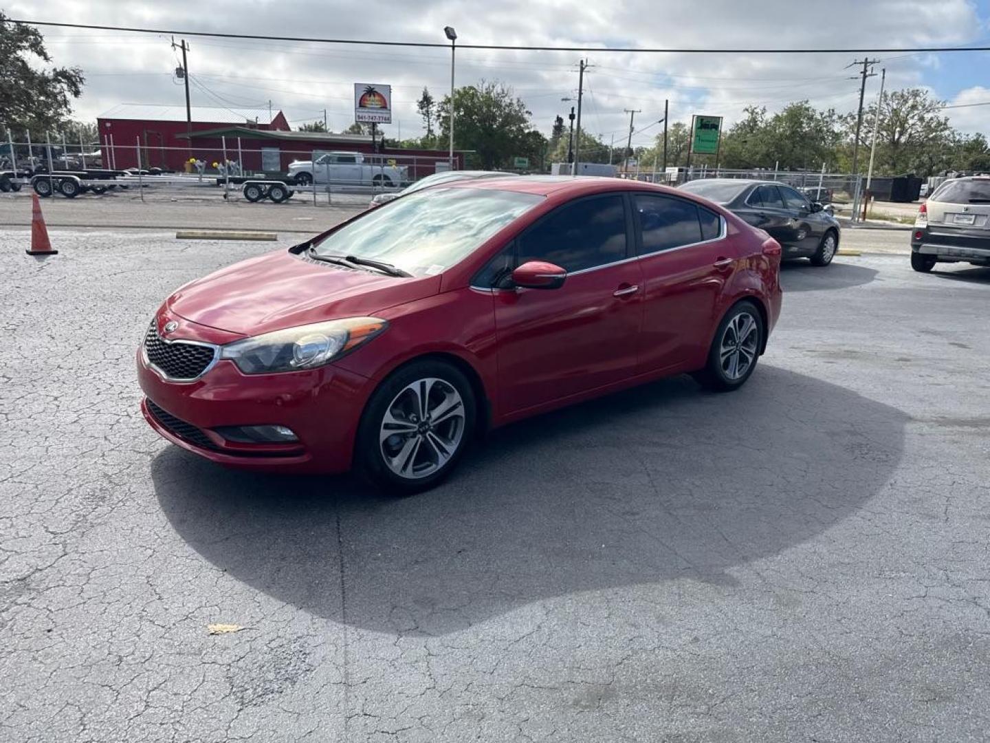 2016 RED KIA FORTE EX (KNAFZ4A84G5) with an 2.0L engine, Automatic transmission, located at 2929 9th St. West, Bradenton, 34205, (941) 242-2810, 27.473591, -82.570679 - Thanks for inquring into DriveNation USA! All vehicles listed can be viewed at www.drivenationusa.com for vehicle history reports and additonal info. We cannot quote any terms such as down payments or monthly payments without an application. You can apply directly at www.drivenationusa.com or by con - Photo#3