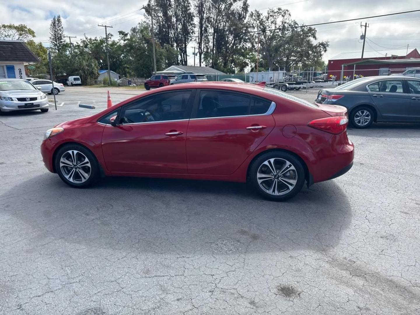 2016 RED KIA FORTE EX (KNAFZ4A84G5) with an 2.0L engine, Automatic transmission, located at 2929 9th St. West, Bradenton, 34205, (941) 242-2810, 27.473591, -82.570679 - Thanks for inquring into DriveNation USA! All vehicles listed can be viewed at www.drivenationusa.com for vehicle history reports and additonal info. We cannot quote any terms such as down payments or monthly payments without an application. You can apply directly at www.drivenationusa.com or by con - Photo#4