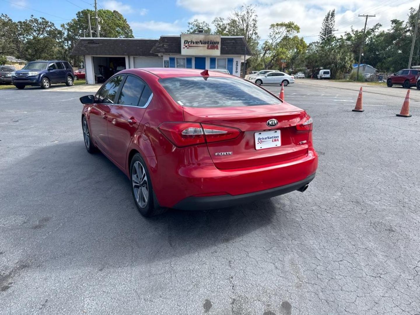 2016 RED KIA FORTE EX (KNAFZ4A84G5) with an 2.0L engine, Automatic transmission, located at 2929 9th St. West, Bradenton, 34205, (941) 242-2810, 27.473591, -82.570679 - Thanks for inquring into DriveNation USA! All vehicles listed can be viewed at www.drivenationusa.com for vehicle history reports and additonal info. We cannot quote any terms such as down payments or monthly payments without an application. You can apply directly at www.drivenationusa.com or by con - Photo#5