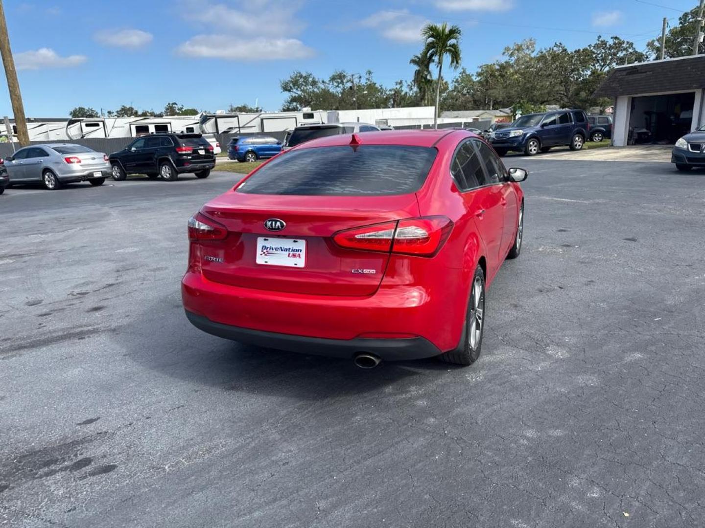 2016 RED KIA FORTE EX (KNAFZ4A84G5) with an 2.0L engine, Automatic transmission, located at 2929 9th St. West, Bradenton, 34205, (941) 242-2810, 27.473591, -82.570679 - Thanks for inquring into DriveNation USA! All vehicles listed can be viewed at www.drivenationusa.com for vehicle history reports and additonal info. We cannot quote any terms such as down payments or monthly payments without an application. You can apply directly at www.drivenationusa.com or by con - Photo#6