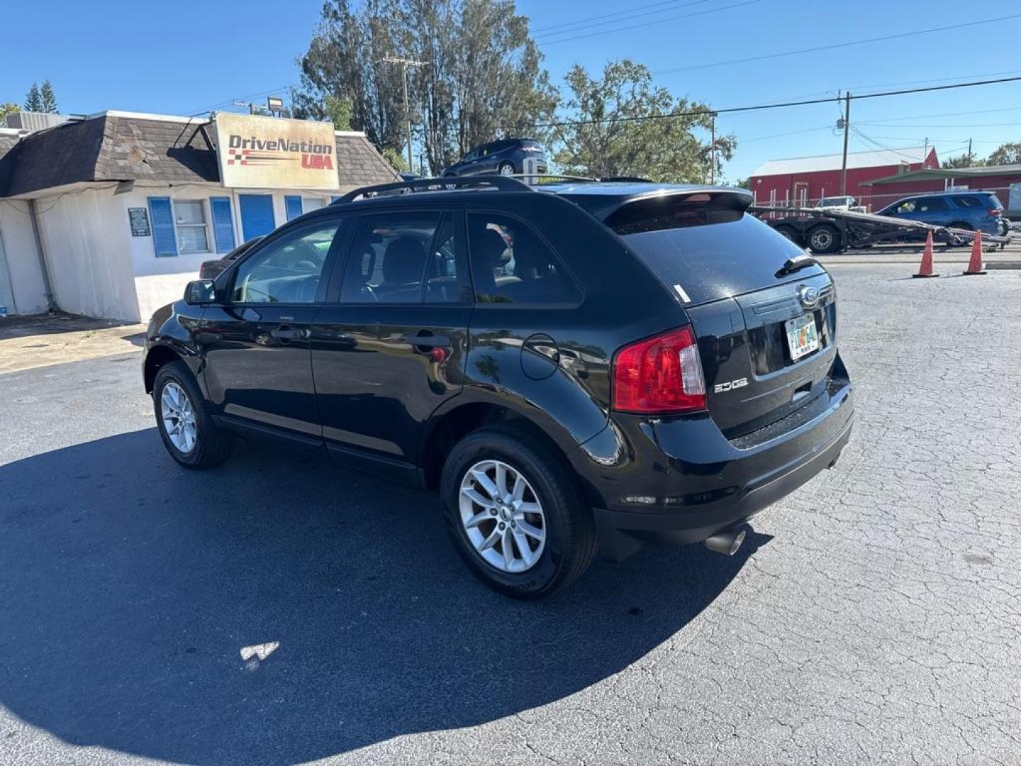 2013 BLACK FORD EDGE SE (2FMDK3GC2DB) with an 3.5L engine, Automatic transmission, located at 2929 9th St. West, Bradenton, 34205, (941) 242-2810, 27.473591, -82.570679 - Thanks for inquring into DriveNation USA! All vehicles listed can be viewed at www.drivenationusa.com for vehicle history reports and additonal info. We cannot quote any terms such as down payments or monthly payments without an application. You can apply directly at www.drivenationusa.com or by con - Photo#5