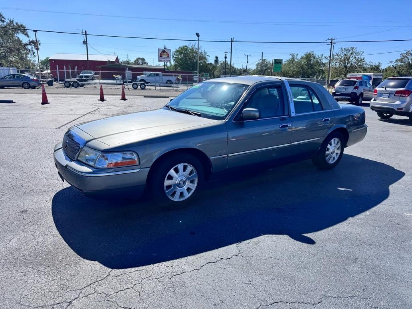 2004 GRAY MERCURY GRAND MARQUIS LS (2MEFM75W94X) with an 4.6L engine, Automatic transmission, located at 2929 9th St. West, Bradenton, 34205, (941) 242-2810, 27.473591, -82.570679 - Thanks for inquring into DriveNation USA! All vehicles listed can be viewed at www.drivenationusa.com for vehicle history reports and additonal info. We cannot quote any terms such as down payments or monthly payments without an application. You can apply directly at www.drivenationusa.com or by con - Photo#4