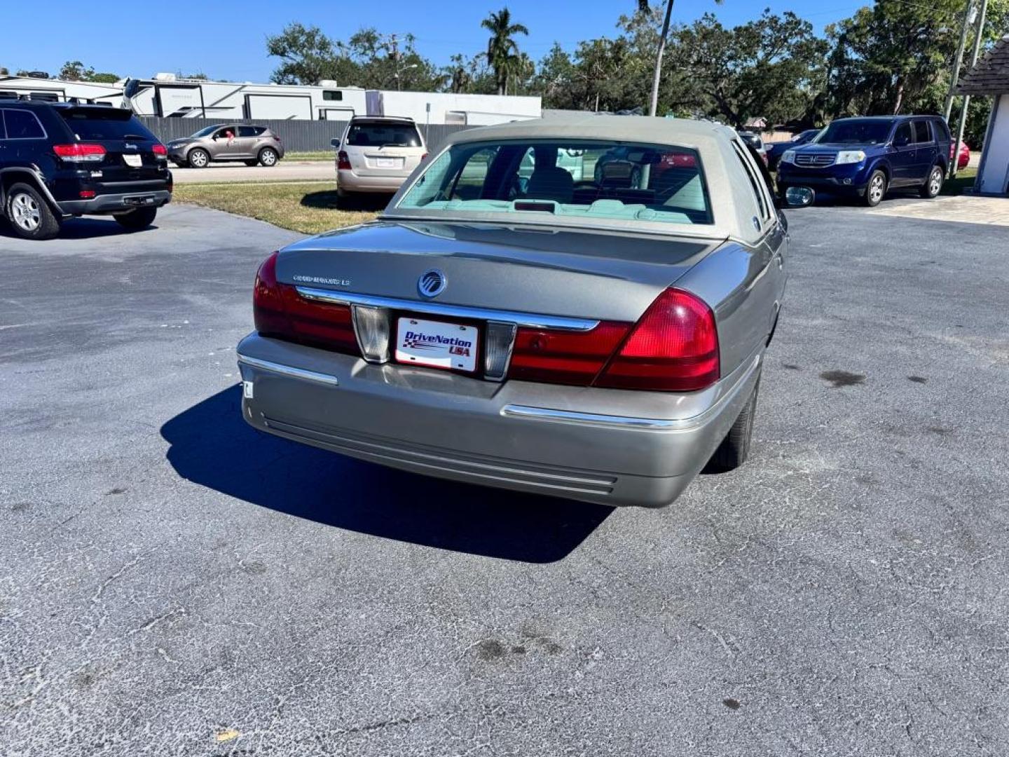 2004 GRAY MERCURY GRAND MARQUIS LS (2MEFM75W94X) with an 4.6L engine, Automatic transmission, located at 2929 9th St. West, Bradenton, 34205, (941) 242-2810, 27.473591, -82.570679 - Thanks for inquring into DriveNation USA! All vehicles listed can be viewed at www.drivenationusa.com for vehicle history reports and additonal info. We cannot quote any terms such as down payments or monthly payments without an application. You can apply directly at www.drivenationusa.com or by con - Photo#5