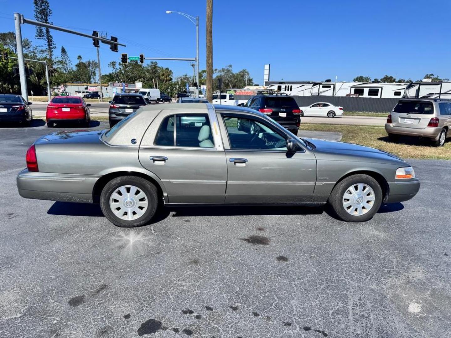 2004 GRAY MERCURY GRAND MARQUIS LS (2MEFM75W94X) with an 4.6L engine, Automatic transmission, located at 2929 9th St. West, Bradenton, 34205, (941) 242-2810, 27.473591, -82.570679 - Thanks for inquring into DriveNation USA! All vehicles listed can be viewed at www.drivenationusa.com for vehicle history reports and additonal info. We cannot quote any terms such as down payments or monthly payments without an application. You can apply directly at www.drivenationusa.com or by con - Photo#7