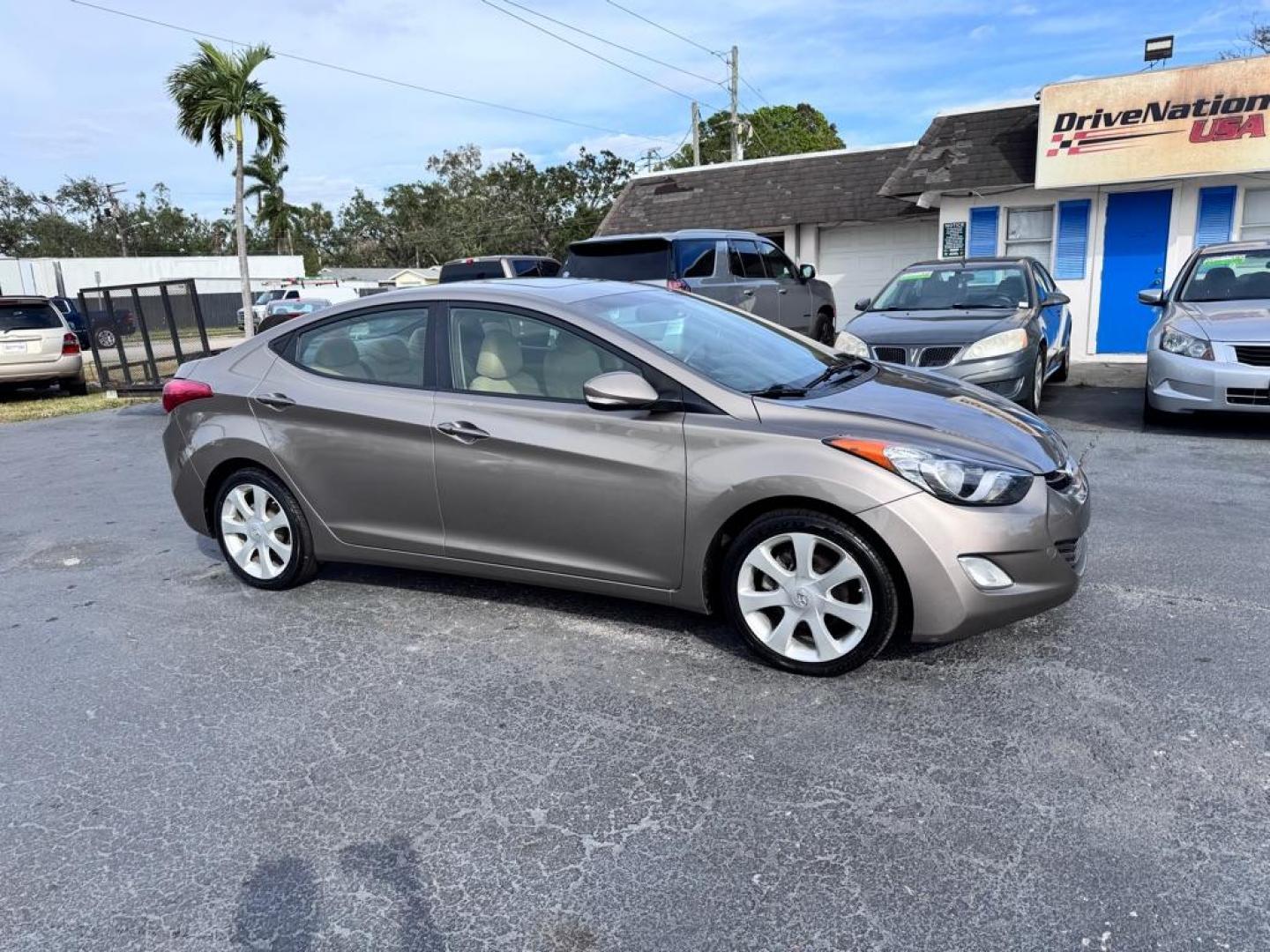 2012 TAN HYUNDAI ELANTRA GLS (5NPDH4AE2CH) with an 1.8L engine, Automatic transmission, located at 2929 9th St. West, Bradenton, 34205, (941) 242-2810, 27.473591, -82.570679 - Thanks for inquring into DriveNation USA! All vehicles listed can be viewed at www.drivenationusa.com for vehicle history reports and additonal info. We cannot quote any terms such as down payments or monthly payments without an application. You can apply directly at www.drivenationusa.com or by con - Photo#1