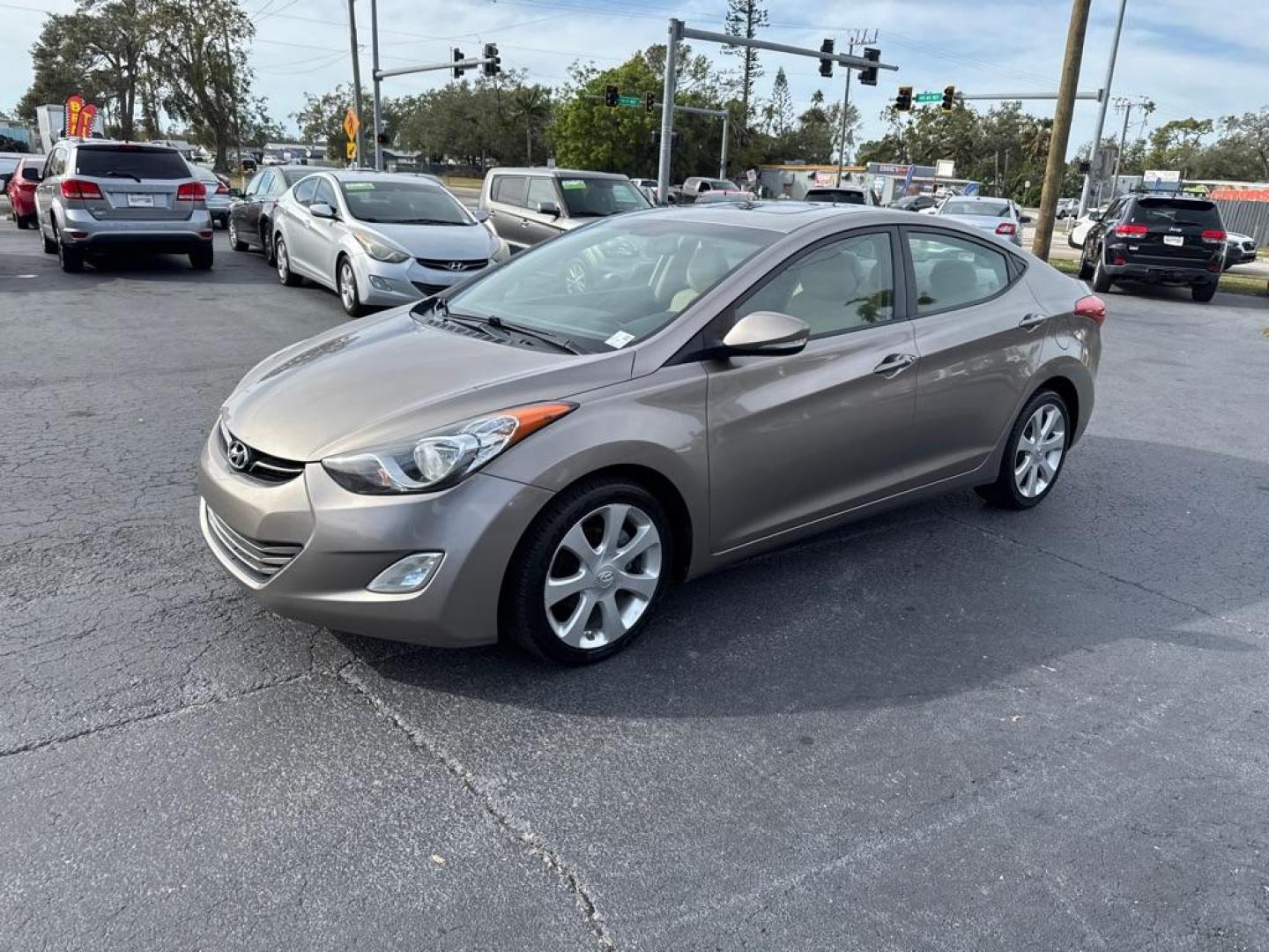 2012 TAN HYUNDAI ELANTRA GLS (5NPDH4AE2CH) with an 1.8L engine, Automatic transmission, located at 2929 9th St. West, Bradenton, 34205, (941) 242-2810, 27.473591, -82.570679 - Thanks for inquring into DriveNation USA! All vehicles listed can be viewed at www.drivenationusa.com for vehicle history reports and additonal info. We cannot quote any terms such as down payments or monthly payments without an application. You can apply directly at www.drivenationusa.com or by con - Photo#3