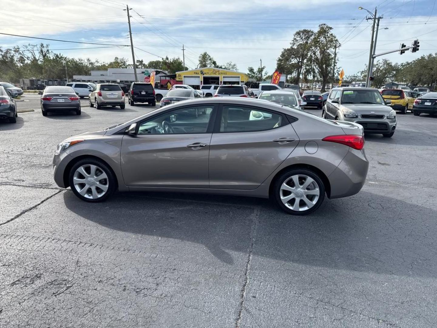 2012 TAN HYUNDAI ELANTRA GLS (5NPDH4AE2CH) with an 1.8L engine, Automatic transmission, located at 2929 9th St. West, Bradenton, 34205, (941) 242-2810, 27.473591, -82.570679 - Thanks for inquring into DriveNation USA! All vehicles listed can be viewed at www.drivenationusa.com for vehicle history reports and additonal info. We cannot quote any terms such as down payments or monthly payments without an application. You can apply directly at www.drivenationusa.com or by con - Photo#4