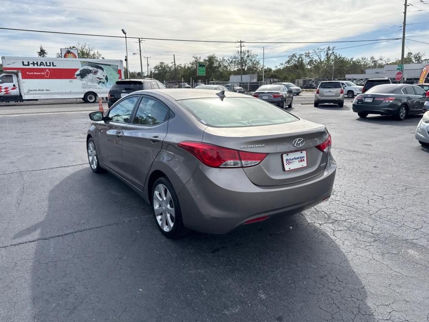 2012 TAN HYUNDAI ELANTRA GLS (5NPDH4AE2CH) with an 1.8L engine, Automatic transmission, located at 2929 9th St. West, Bradenton, 34205, (941) 242-2810, 27.473591, -82.570679 - Thanks for inquring into DriveNation USA! All vehicles listed can be viewed at www.drivenationusa.com for vehicle history reports and additonal info. We cannot quote any terms such as down payments or monthly payments without an application. You can apply directly at www.drivenationusa.com or by con - Photo#5