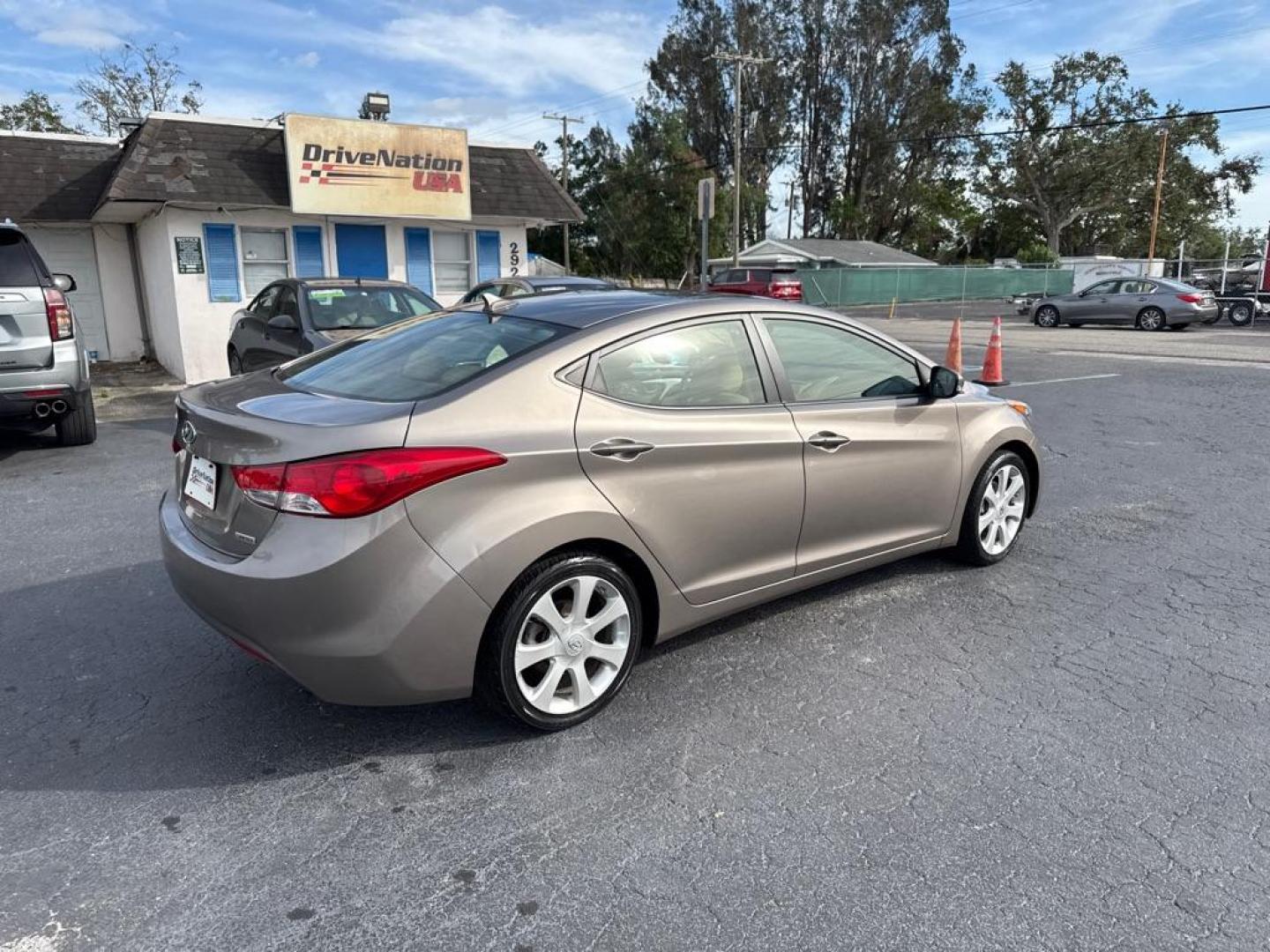 2012 TAN HYUNDAI ELANTRA GLS (5NPDH4AE2CH) with an 1.8L engine, Automatic transmission, located at 2929 9th St. West, Bradenton, 34205, (941) 242-2810, 27.473591, -82.570679 - Thanks for inquring into DriveNation USA! All vehicles listed can be viewed at www.drivenationusa.com for vehicle history reports and additonal info. We cannot quote any terms such as down payments or monthly payments without an application. You can apply directly at www.drivenationusa.com or by con - Photo#7