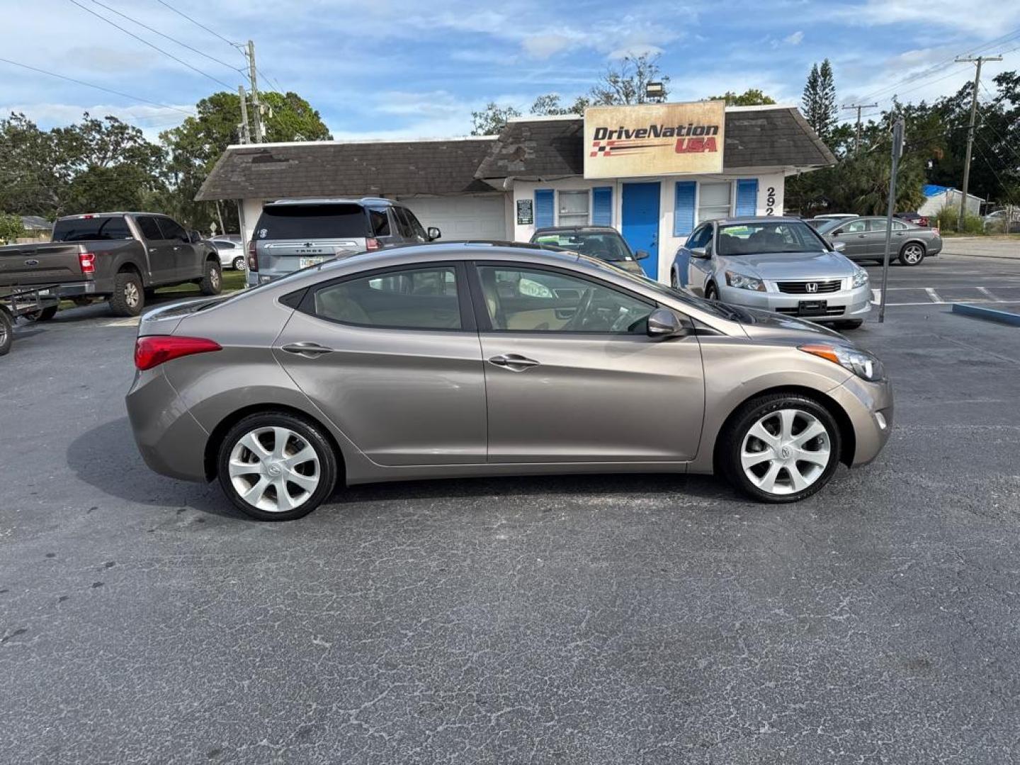 2012 TAN HYUNDAI ELANTRA GLS (5NPDH4AE2CH) with an 1.8L engine, Automatic transmission, located at 2929 9th St. West, Bradenton, 34205, (941) 242-2810, 27.473591, -82.570679 - Thanks for inquring into DriveNation USA! All vehicles listed can be viewed at www.drivenationusa.com for vehicle history reports and additonal info. We cannot quote any terms such as down payments or monthly payments without an application. You can apply directly at www.drivenationusa.com or by con - Photo#8