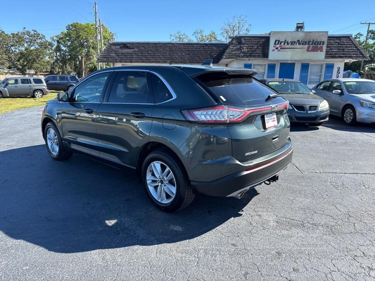 2015 GRAY FORD EDGE SEL (2FMTK3J83FB) with an 3.5L engine, Automatic transmission, located at 2929 9th St. West, Bradenton, 34205, (941) 242-2810, 27.473591, -82.570679 - Thanks for inquring into DriveNation USA! All vehicles listed can be viewed at www.drivenationusa.com for vehicle history reports and additonal info. We cannot quote any terms such as down payments or monthly payments without an application. You can apply directly at www.drivenationusa.com or by con - Photo#5