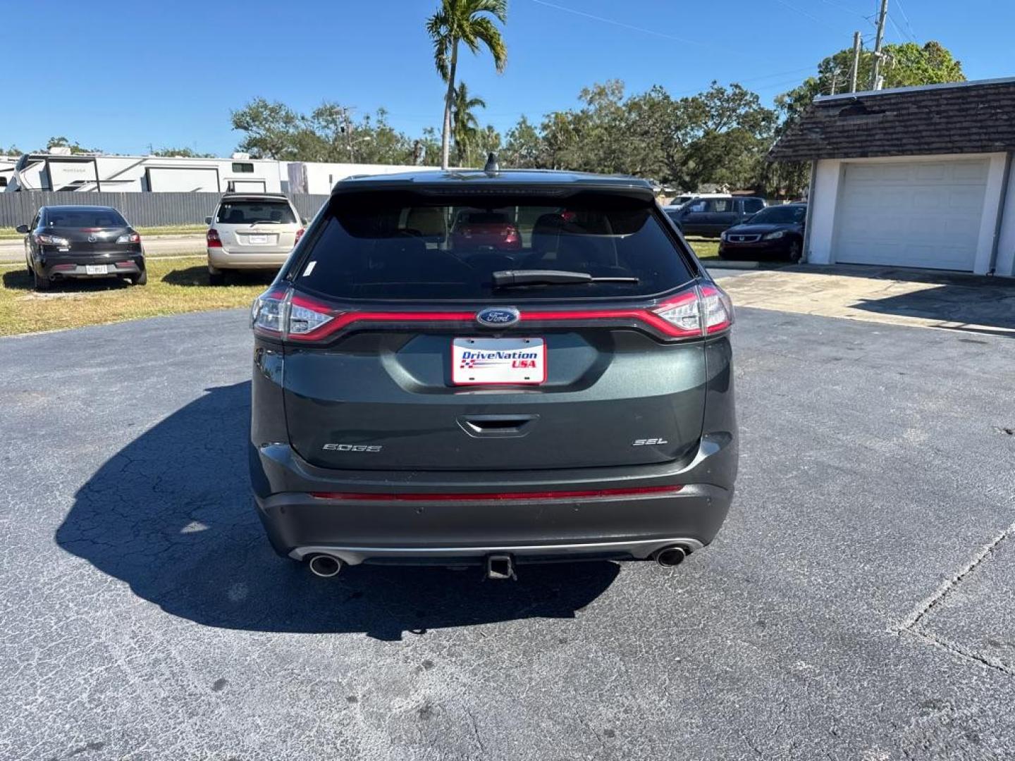 2015 GRAY FORD EDGE SEL (2FMTK3J83FB) with an 3.5L engine, Automatic transmission, located at 2929 9th St. West, Bradenton, 34205, (941) 242-2810, 27.473591, -82.570679 - Thanks for inquring into DriveNation USA! All vehicles listed can be viewed at www.drivenationusa.com for vehicle history reports and additonal info. We cannot quote any terms such as down payments or monthly payments without an application. You can apply directly at www.drivenationusa.com or by con - Photo#6