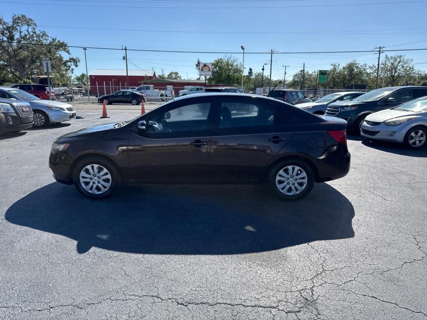 2010 PURPLE KIA FORTE EX (KNAFU4A28A5) with an 2.0L engine, Automatic transmission, located at 2929 9th St. West, Bradenton, 34205, (941) 242-2810, 27.473591, -82.570679 - Thanks for inquring into DriveNation USA! All vehicles listed can be viewed at www.drivenationusa.com for vehicle history reports and additonal info. We cannot quote any terms such as down payments or monthly payments without an application. You can apply directly at www.drivenationusa.com or by con - Photo#4