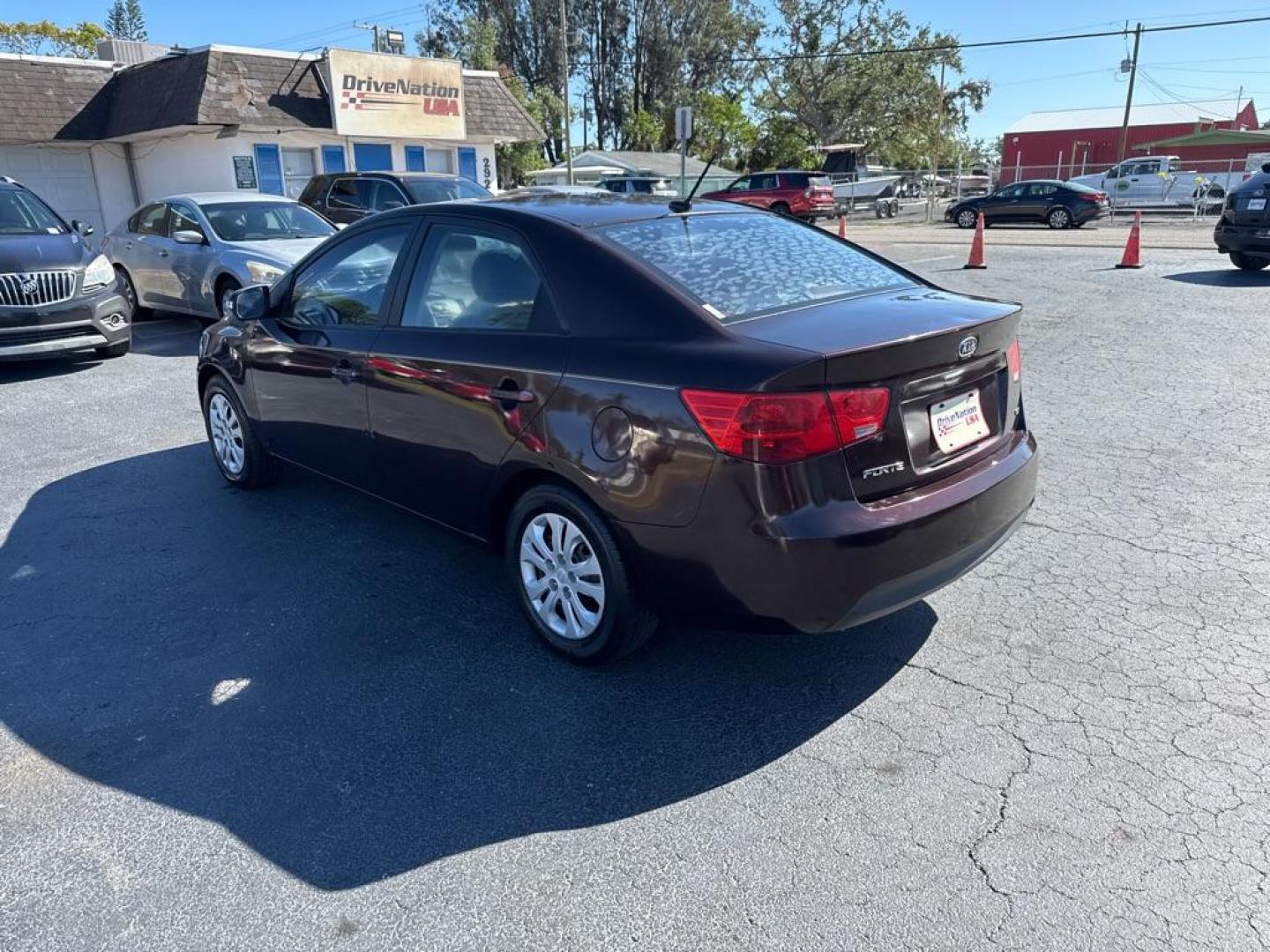 2010 PURPLE KIA FORTE EX (KNAFU4A28A5) with an 2.0L engine, Automatic transmission, located at 2929 9th St. West, Bradenton, 34205, (941) 242-2810, 27.473591, -82.570679 - Thanks for inquring into DriveNation USA! All vehicles listed can be viewed at www.drivenationusa.com for vehicle history reports and additonal info. We cannot quote any terms such as down payments or monthly payments without an application. You can apply directly at www.drivenationusa.com or by con - Photo#5