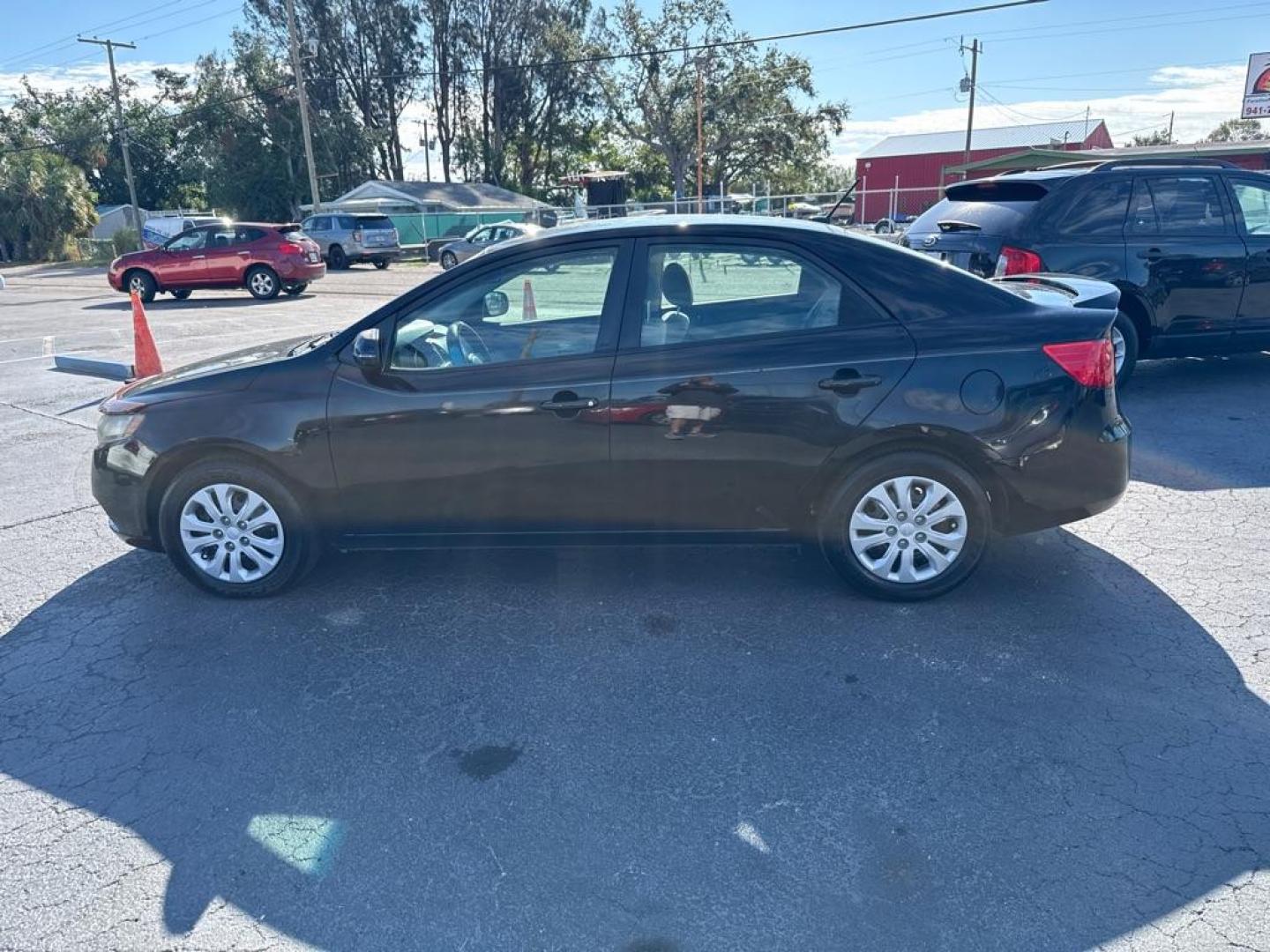 2012 BLACK KIA FORTE EX (KNAFU4A22C5) with an 2.0L engine, Automatic transmission, located at 2929 9th St. West, Bradenton, 34205, (941) 242-2810, 27.473591, -82.570679 - Thanks for inquring into DriveNation USA! All vehicles listed can be viewed at www.drivenationusa.com for vehicle history reports and additonal info. We cannot quote any terms such as down payments or monthly payments without an application. You can apply directly at www.drivenationusa.com or by con - Photo#4