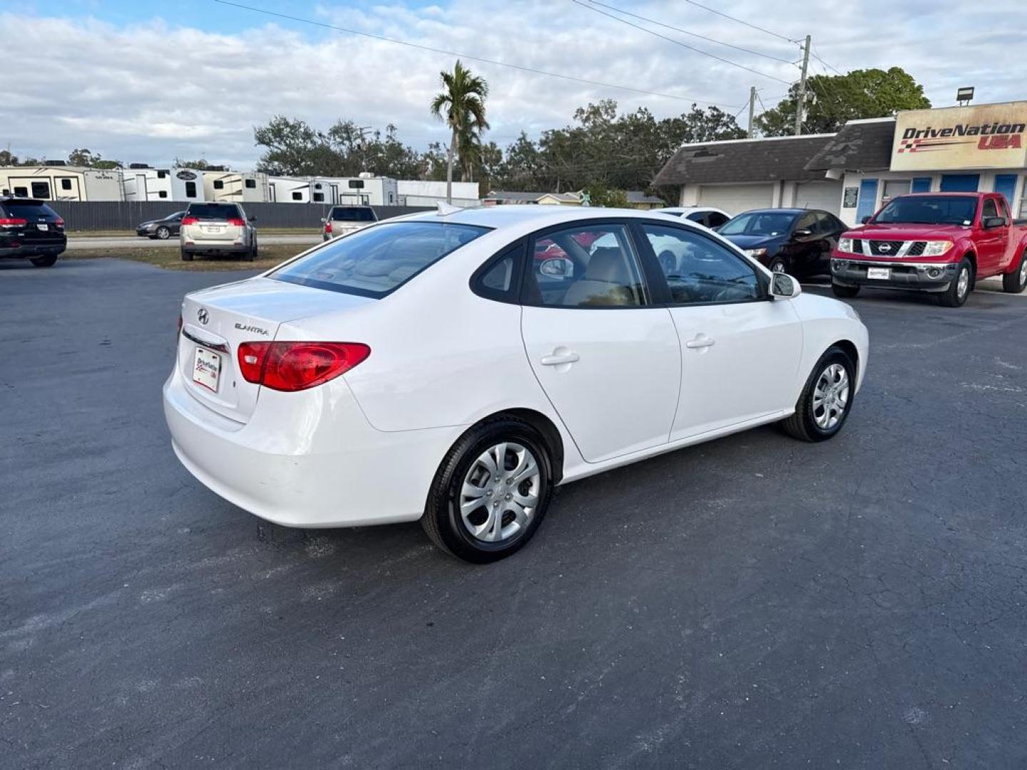 2010 WHITE HYUNDAI ELANTRA BLUE (KMHDU4AD4AU) with an 2.0L engine, Automatic transmission, located at 2929 9th St. West, Bradenton, 34205, (941) 242-2810, 27.473591, -82.570679 - Thanks for inquring into DriveNation USA! All vehicles listed can be viewed at www.drivenationusa.com for vehicle history reports and additonal info. We cannot quote any terms such as down payments or monthly payments without an application. You can apply directly at www.drivenationusa.com or by con - Photo#6