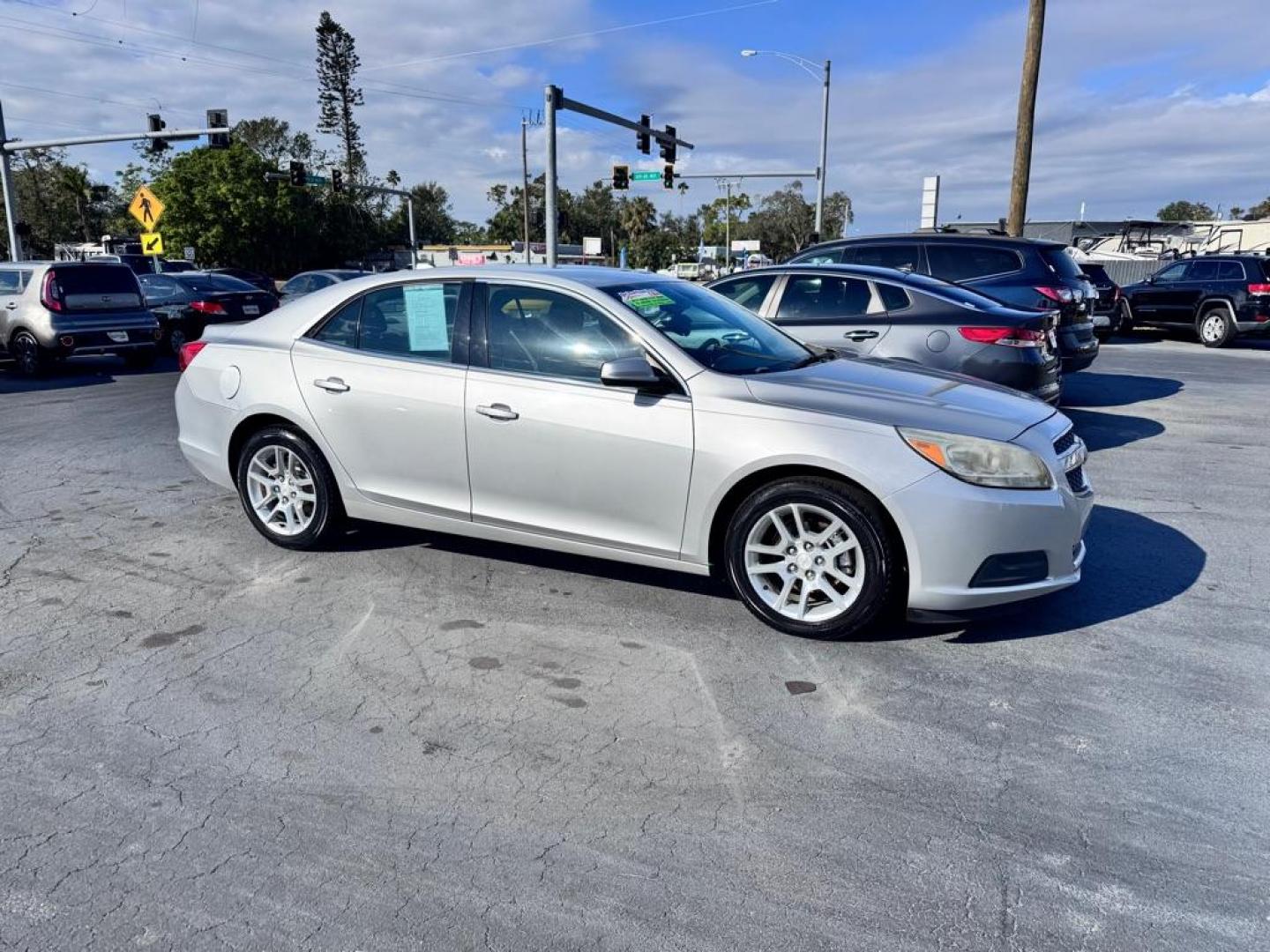 2013 SILVER CHEVROLET MALIBU 1LT (1G11D5RR9DF) with an 2.4L engine, Automatic transmission, located at 2929 9th St. West, Bradenton, 34205, (941) 242-2810, 27.473591, -82.570679 - Photo#0