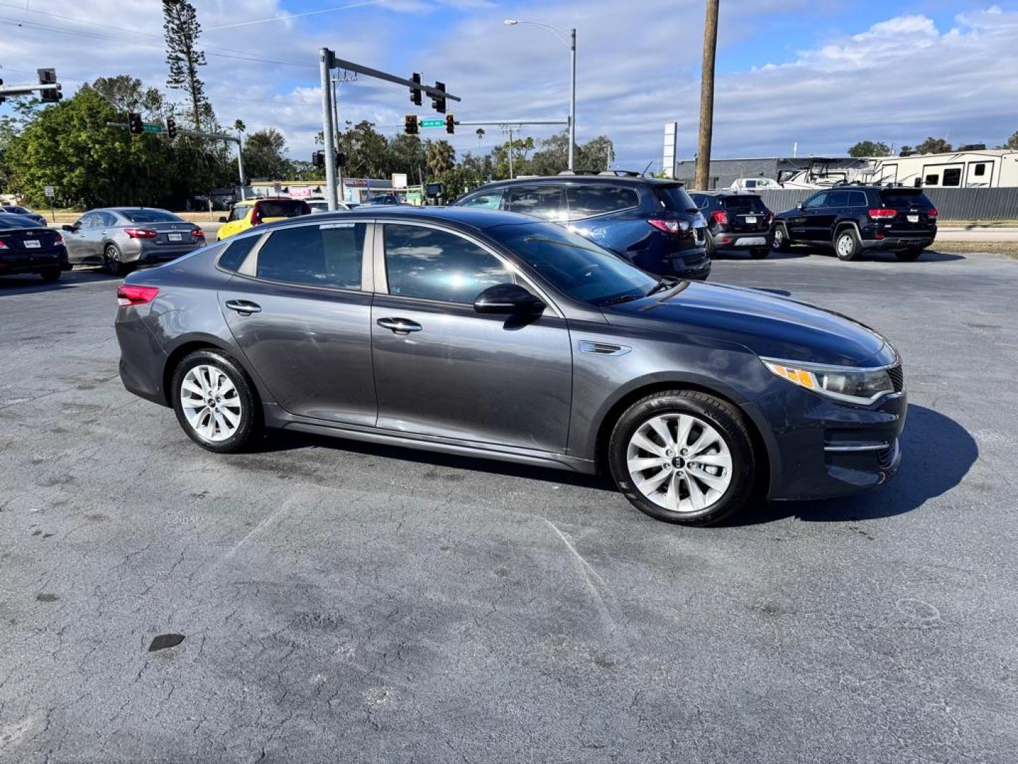 2017 GRAY KIA OPTIMA LX (5XXGT4L3XHG) with an 2.4L engine, Automatic transmission, located at 2929 9th St. West, Bradenton, 34205, (941) 242-2810, 27.473591, -82.570679 - Thanks for inquring into DriveNation USA! All vehicles listed can be viewed at www.drivenationusa.com for vehicle history reports and additonal info. We cannot quote any terms such as down payments or monthly payments without an application. You can apply directly at www.drivenationusa.com or by con - Photo#0