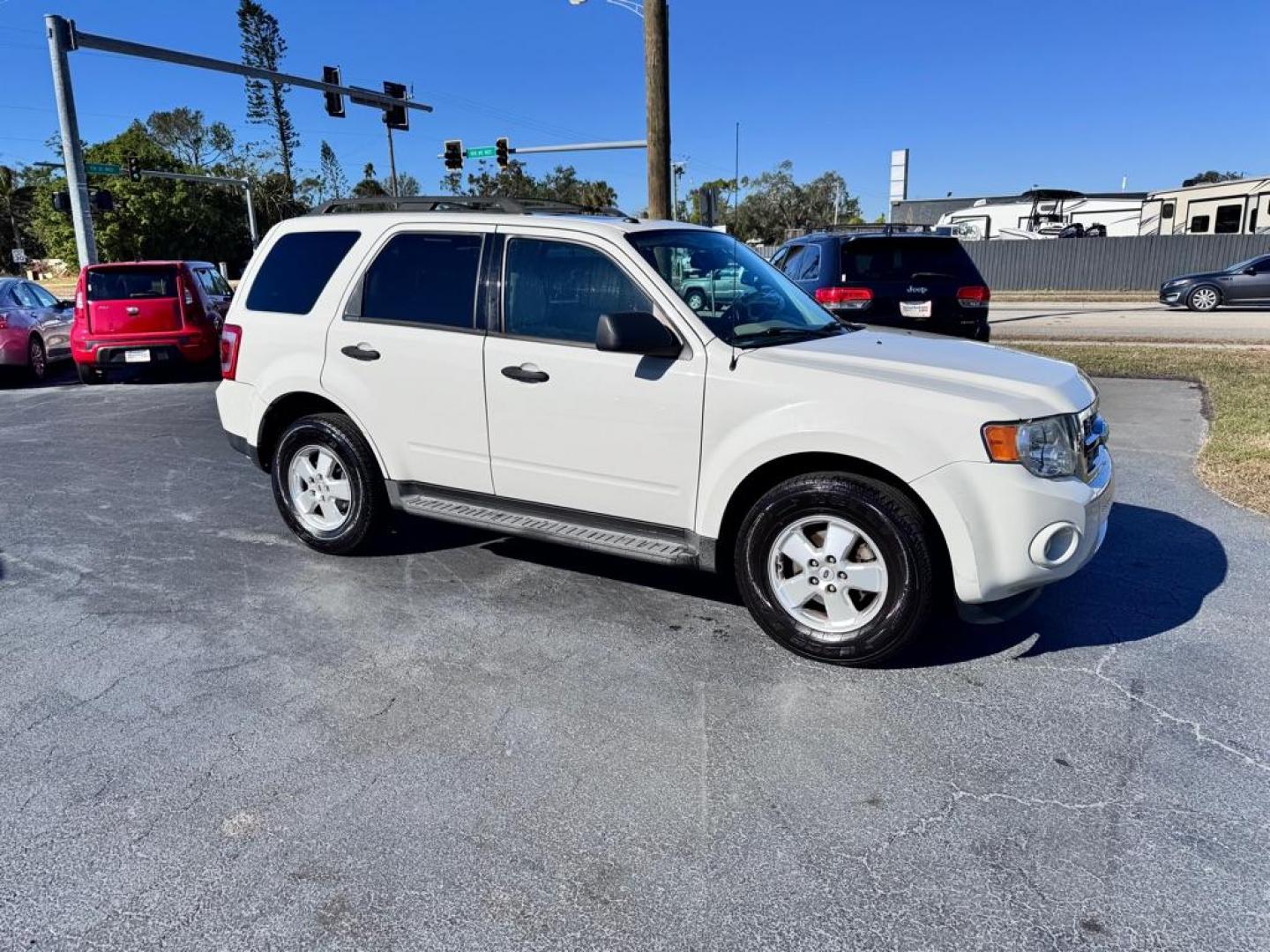 2011 WHITE FORD ESCAPE XLT (1FMCU0D74BK) with an 2.5L engine, Automatic transmission, located at 2929 9th St. West, Bradenton, 34205, (941) 242-2810, 27.473591, -82.570679 - Thanks for inquring into DriveNation USA! All vehicles listed can be viewed at www.drivenationusa.com for vehicle history reports and additonal info. We cannot quote any terms such as down payments or monthly payments without an application. You can apply directly at www.drivenationusa.com or by con - Photo#0