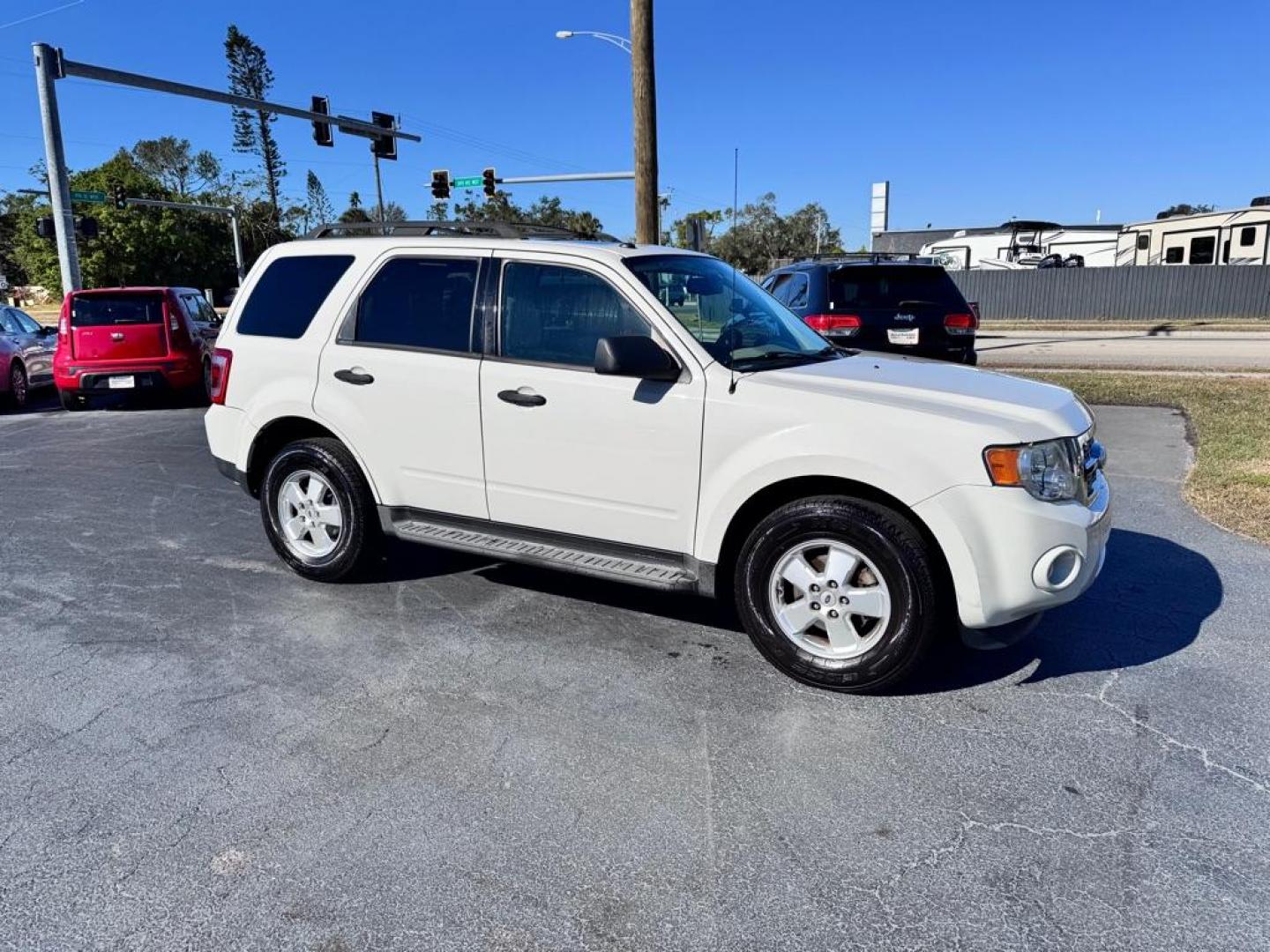 2011 WHITE FORD ESCAPE XLT (1FMCU0D74BK) with an 2.5L engine, Automatic transmission, located at 2929 9th St. West, Bradenton, 34205, (941) 242-2810, 27.473591, -82.570679 - Thanks for inquring into DriveNation USA! All vehicles listed can be viewed at www.drivenationusa.com for vehicle history reports and additonal info. We cannot quote any terms such as down payments or monthly payments without an application. You can apply directly at www.drivenationusa.com or by con - Photo#1