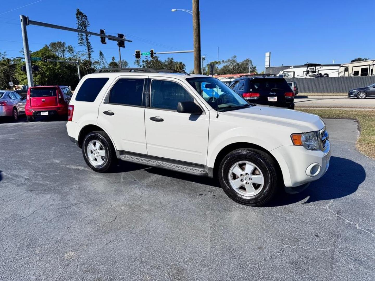 2011 WHITE FORD ESCAPE XLT (1FMCU0D74BK) with an 2.5L engine, Automatic transmission, located at 2929 9th St. West, Bradenton, 34205, (941) 242-2810, 27.473591, -82.570679 - Thanks for inquring into DriveNation USA! All vehicles listed can be viewed at www.drivenationusa.com for vehicle history reports and additonal info. We cannot quote any terms such as down payments or monthly payments without an application. You can apply directly at www.drivenationusa.com or by con - Photo#2